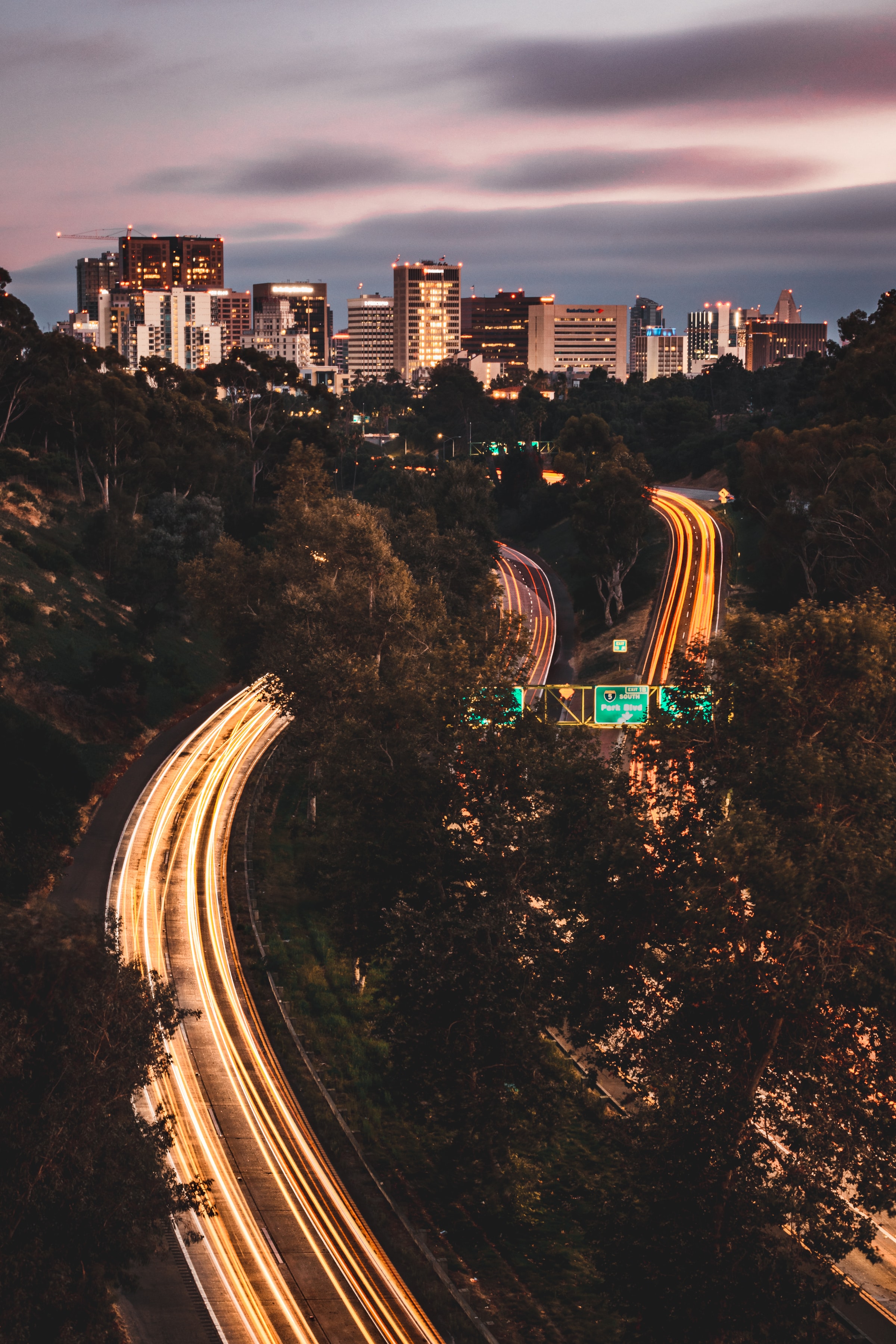 Download mobile wallpaper Long Exposure, Trees, City, Cities, Road, Glow, Lines for free.