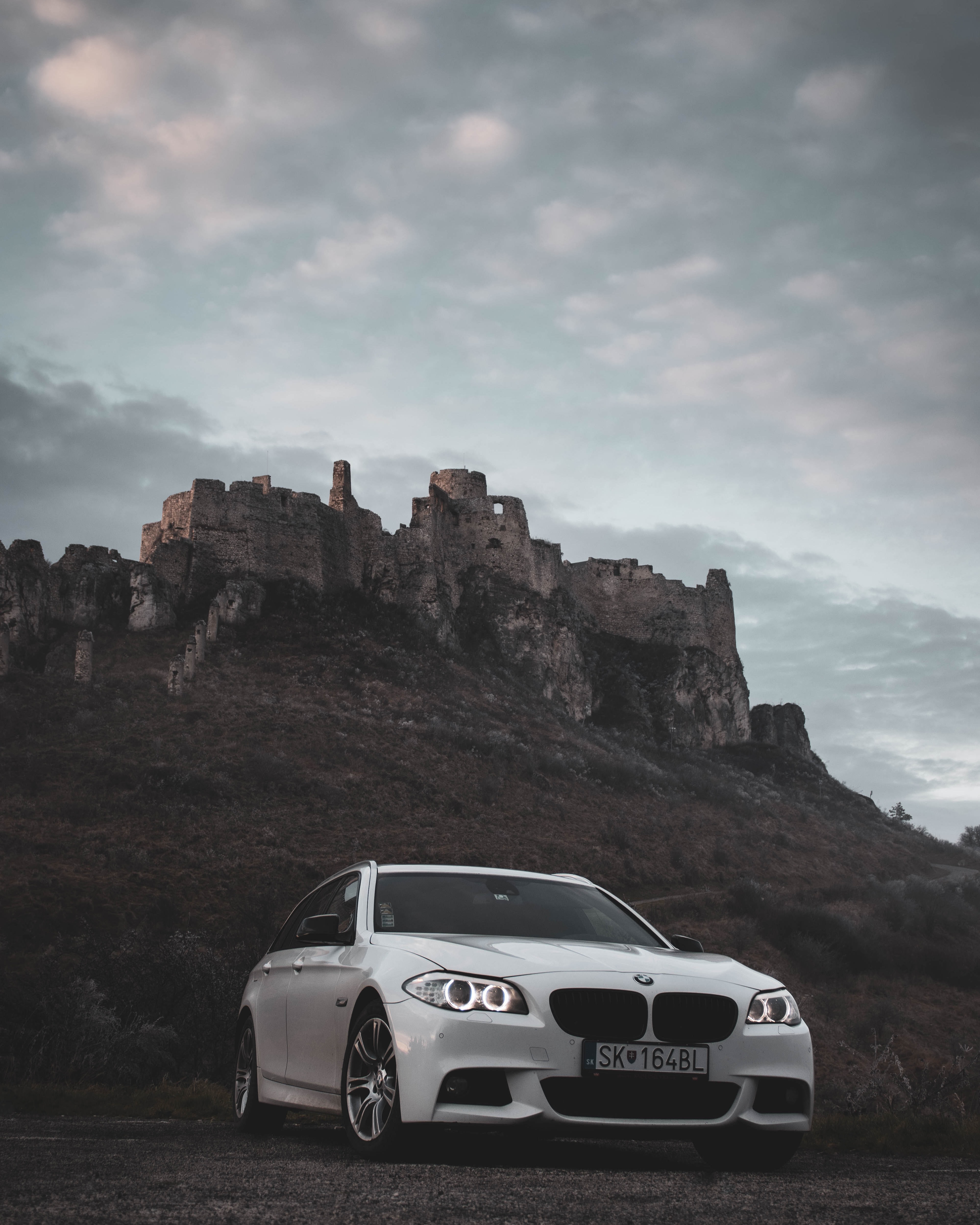 Free download wallpaper Rock, Nature, Cars, Car, Front View, Bmw on your PC desktop