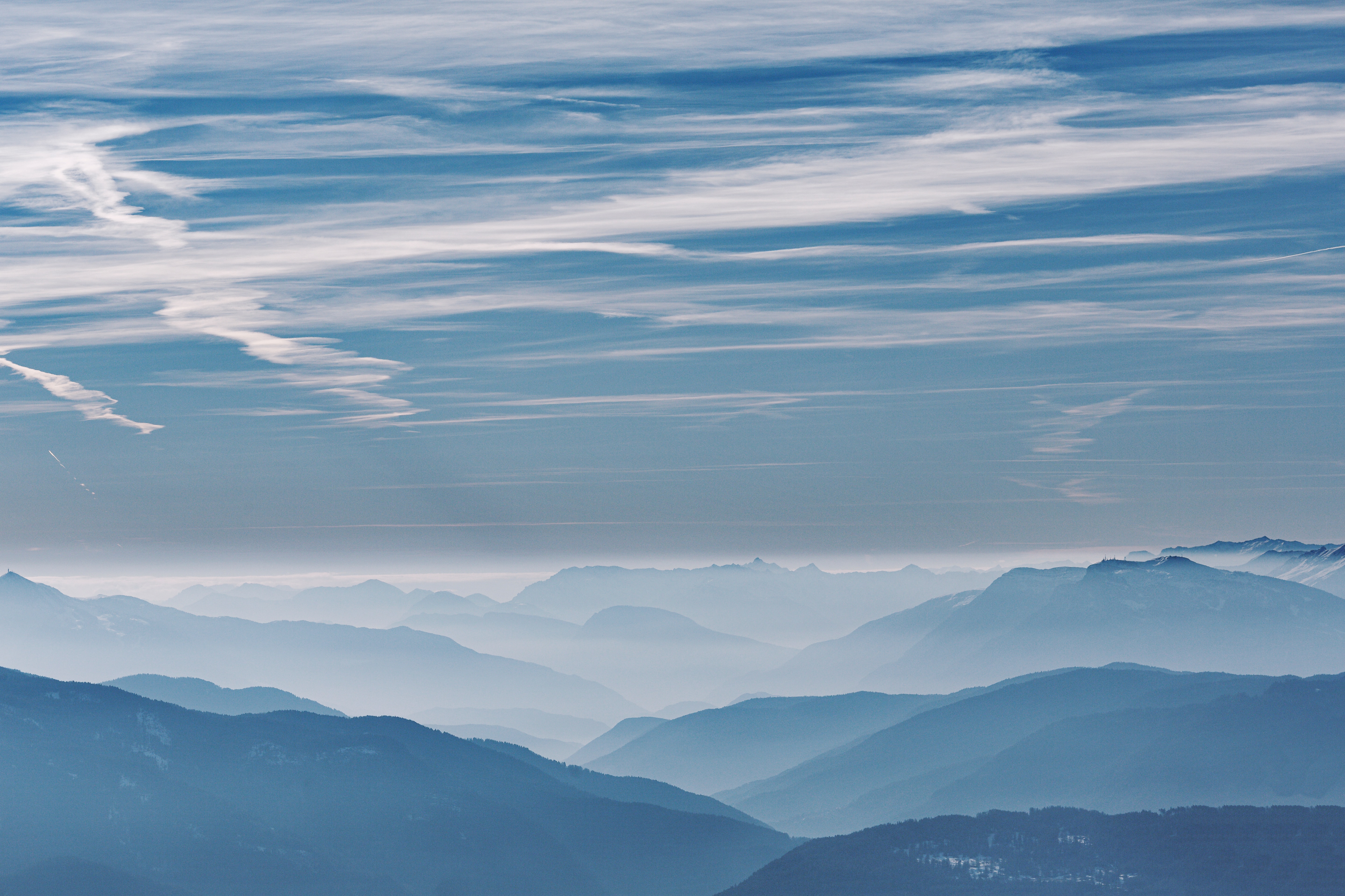 Download mobile wallpaper Haze, Clouds, Fog, Mountains, Landscape, Nature for free.