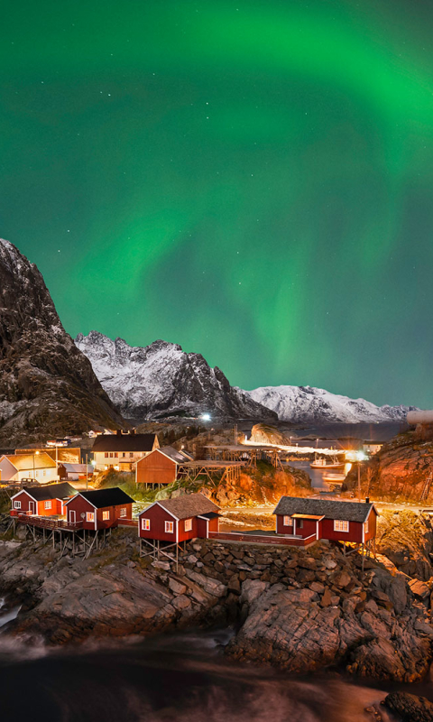 Download mobile wallpaper Landscape, Winter, Night, Mountain, Light, Village, Aurora Borealis, Norway, Man Made for free.