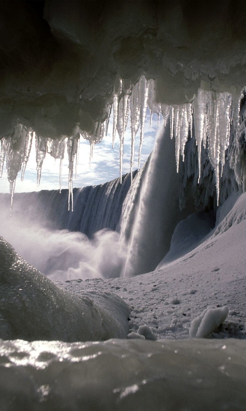 Скачати мобільні шпалери Зима, Водоспад, Земля, Печера безкоштовно.