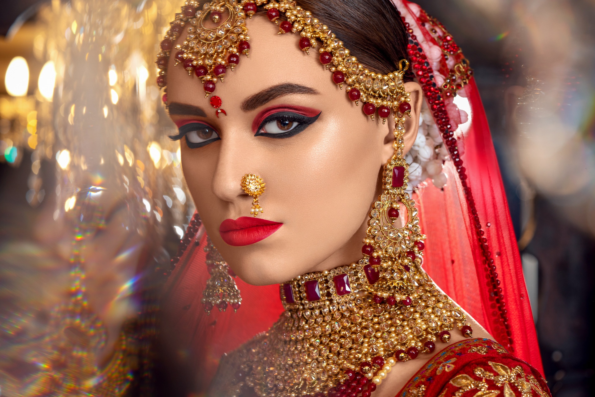 Download mobile wallpaper Jewelry, Face, Model, Women, Earrings, Makeup, Indian, Necklace, Brown Eyes, Lipstick, Stare for free.