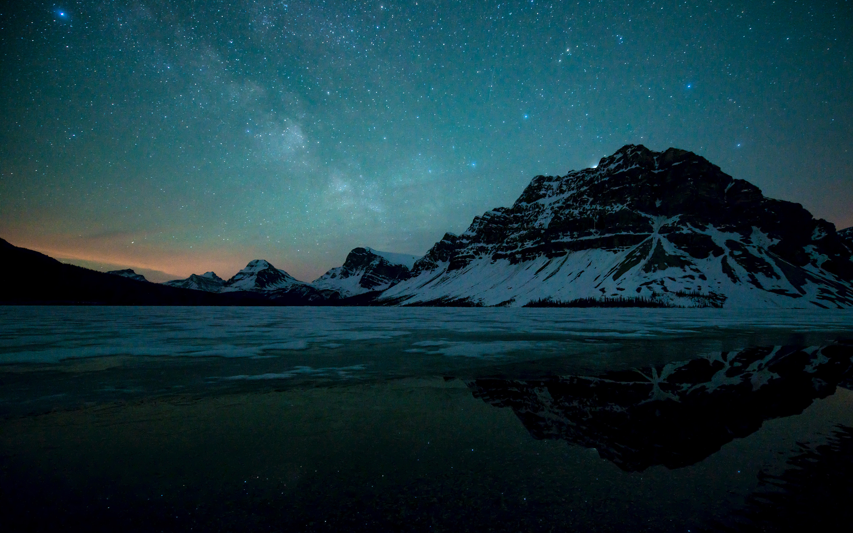 Download mobile wallpaper Landscape, Winter, Nature, Water, Night, Mountain, Lake, Reflection, Starry Sky, Earth for free.