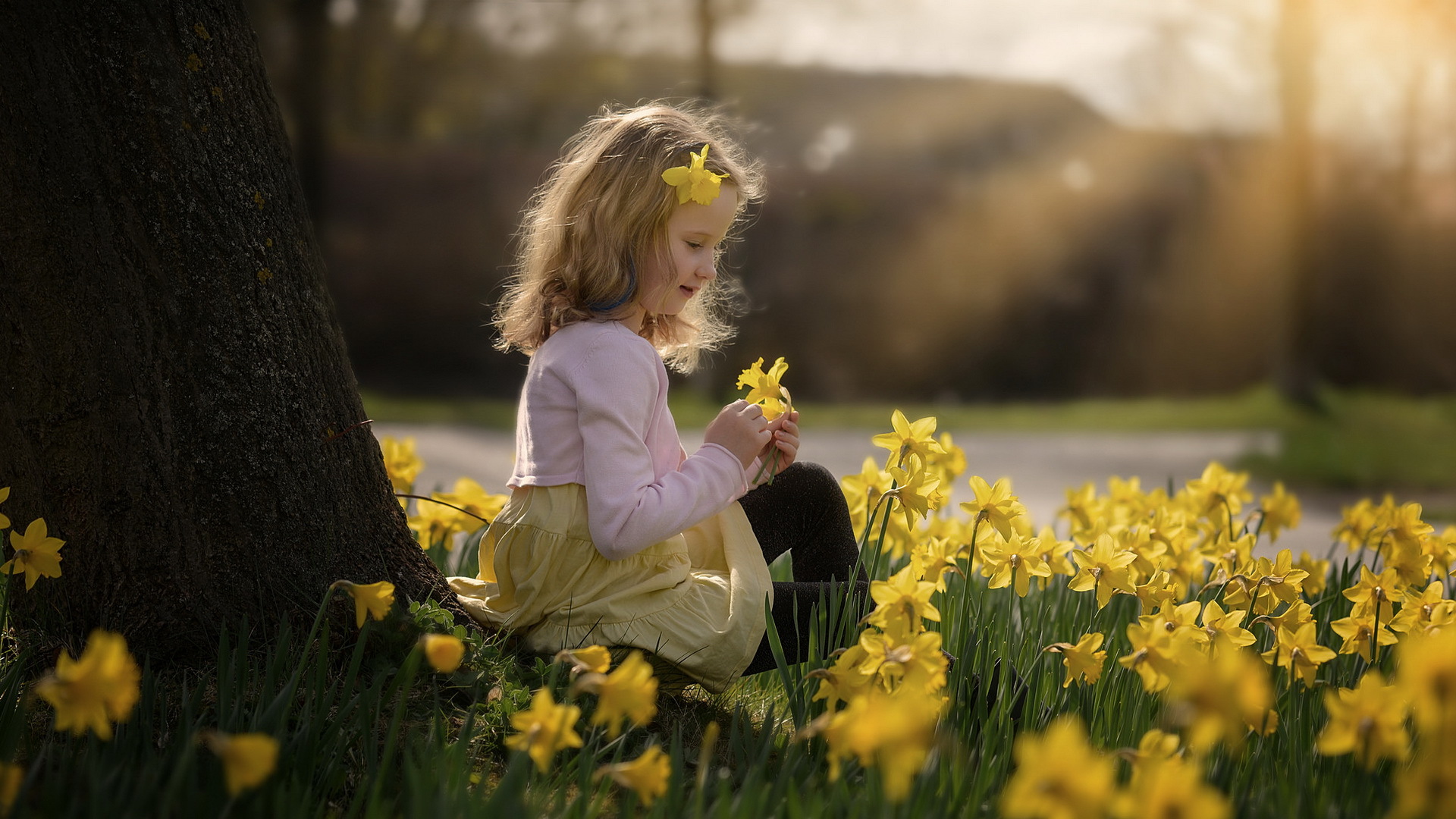 Download mobile wallpaper Flower, Spring, Child, Photography, Yellow Flower, Sunbeam, Little Girl, Daffodil for free.