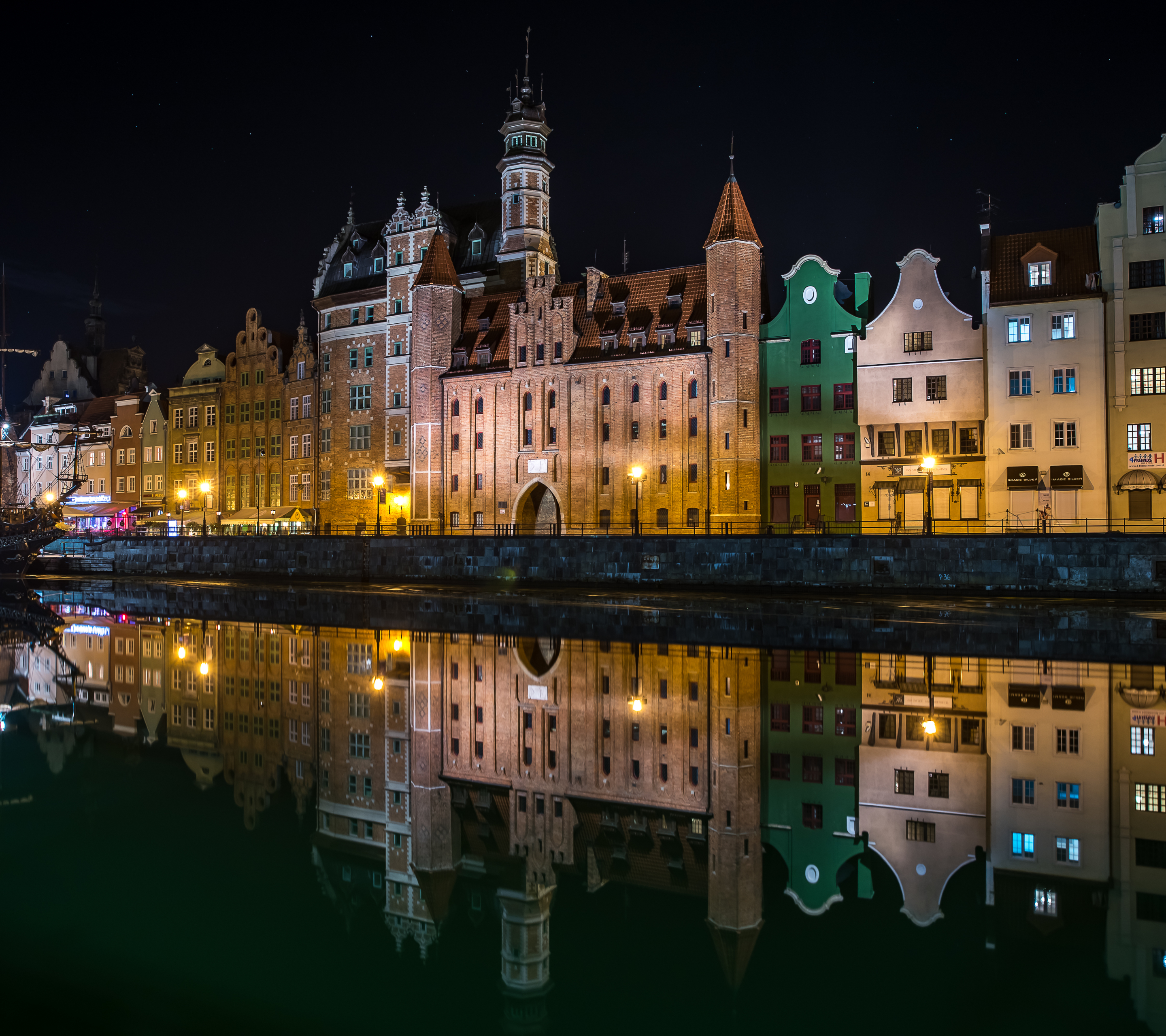 Download mobile wallpaper Night, Poland, Reflection, Light, River, Town, Man Made, Gdansk, Towns for free.