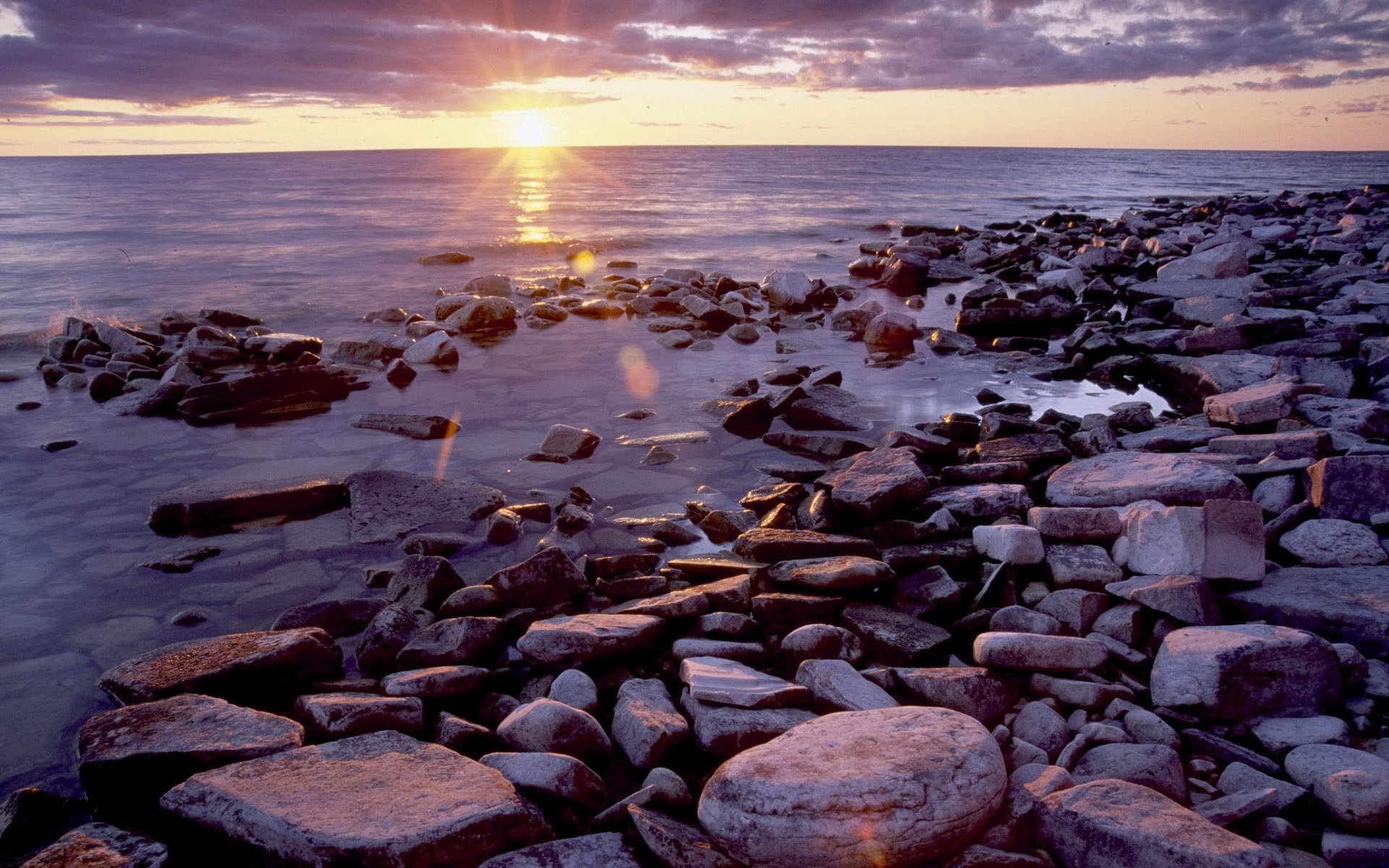 Download mobile wallpaper Stones, Landscape, Sunset, Sea for free.