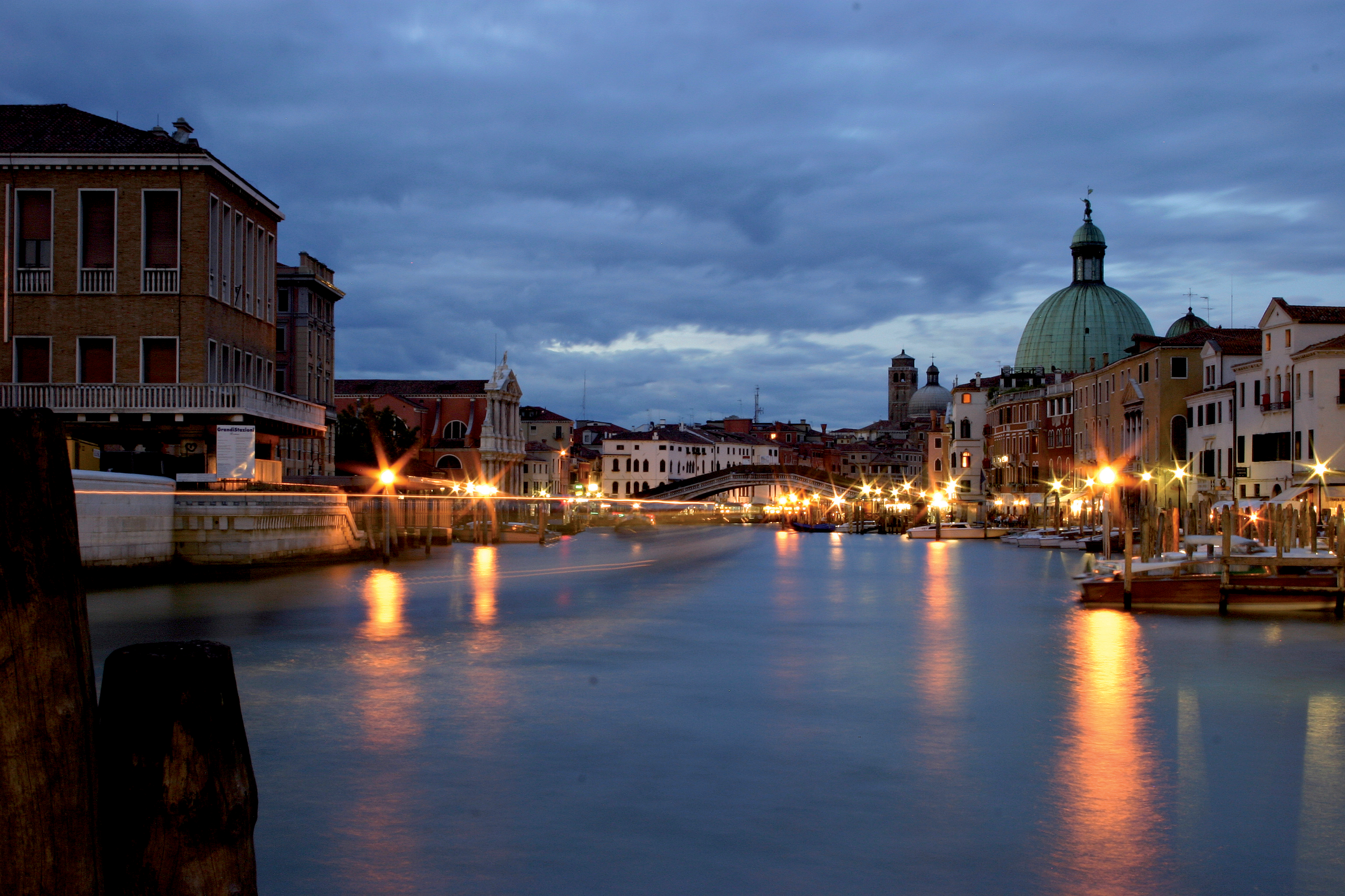 Download mobile wallpaper Cities, Night, Italy, Venice, City, Light, Boat, Man Made, Canal for free.