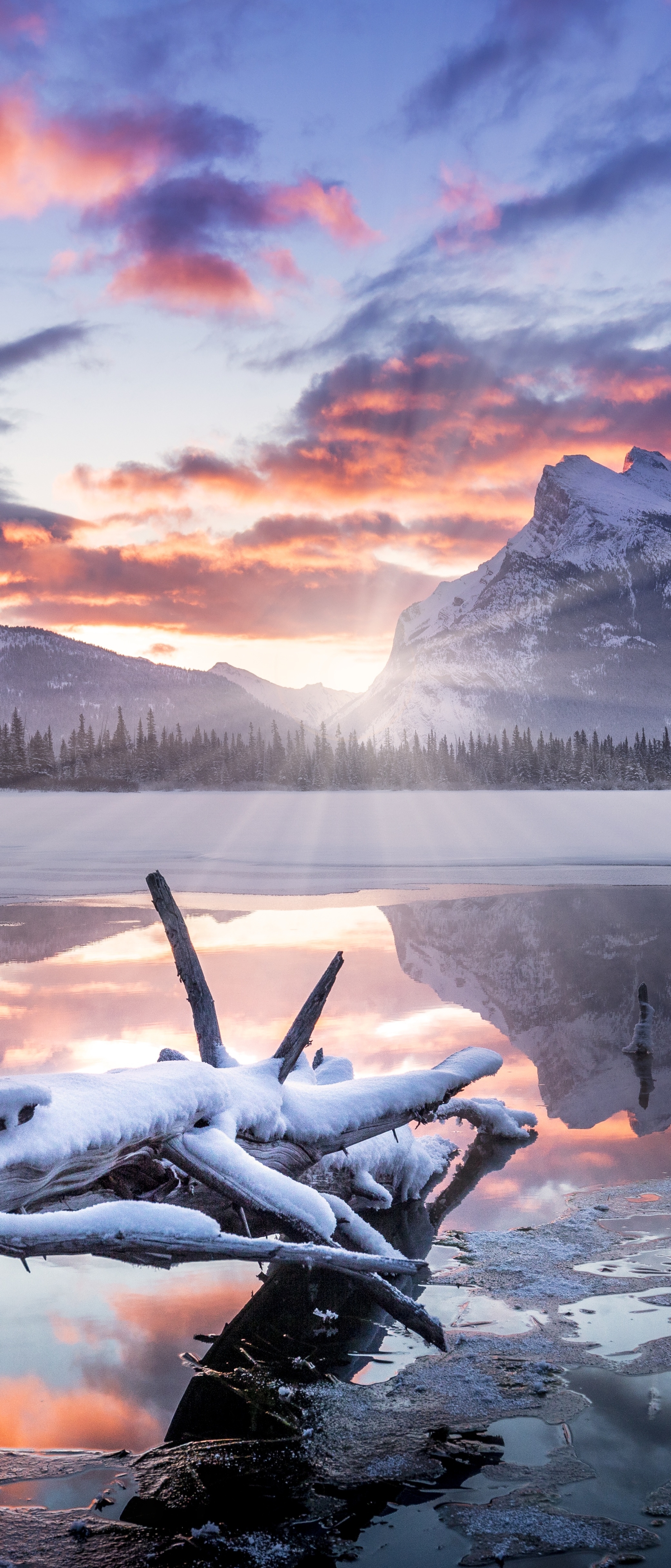 Handy-Wallpaper Winter, Natur, Kanada, Nationalpark, Banff Nationalpark, Sonnenstrahl, Erde/natur, Sonnenbohne kostenlos herunterladen.