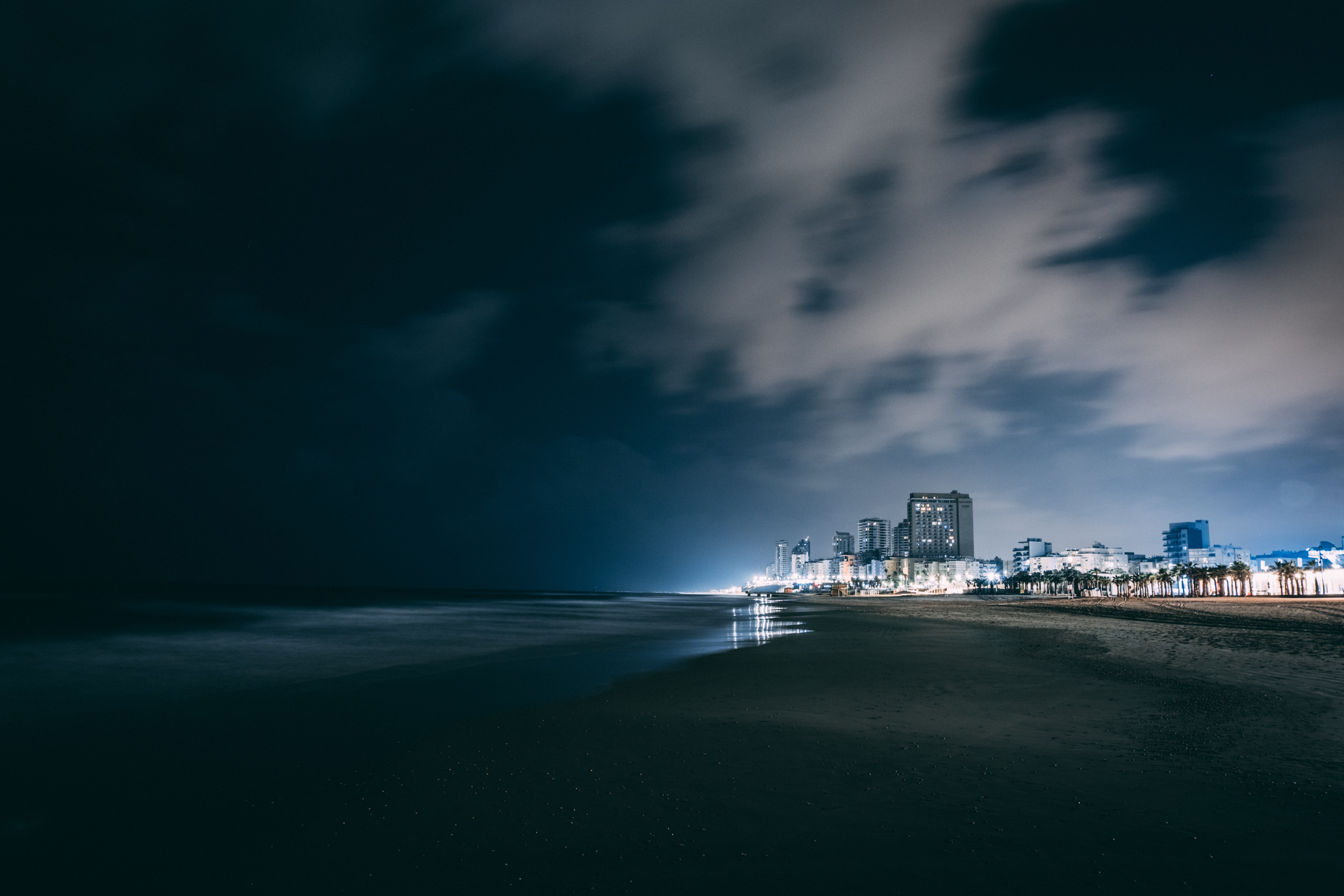 Free download wallpaper Cities, Sky, Clouds, Night City, Overcast, Mainly Cloudy, Night, Beach on your PC desktop
