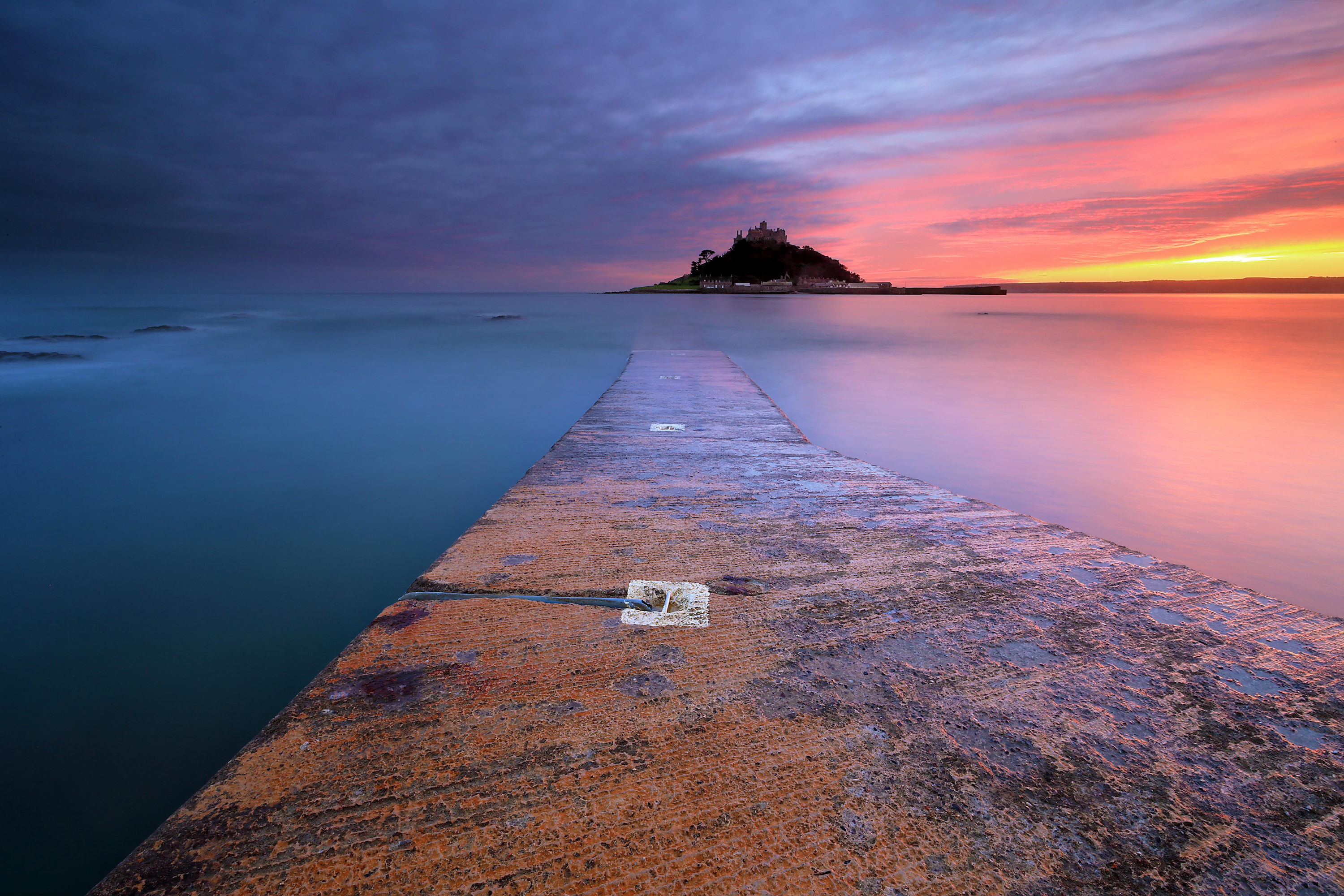 Download mobile wallpaper Sunset, Sea, Beach, Castles, Ocean, Man Made, Castle for free.