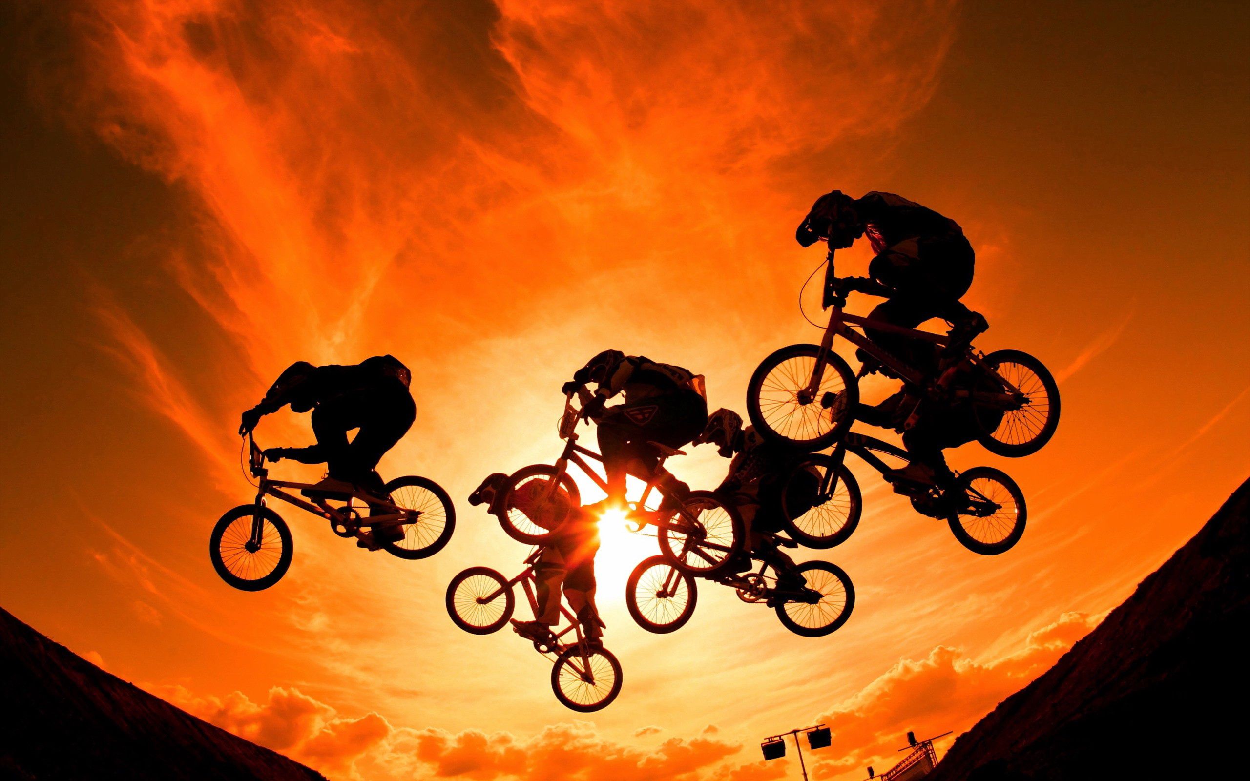 Download background sports, sunset, sky, sun, cyclists