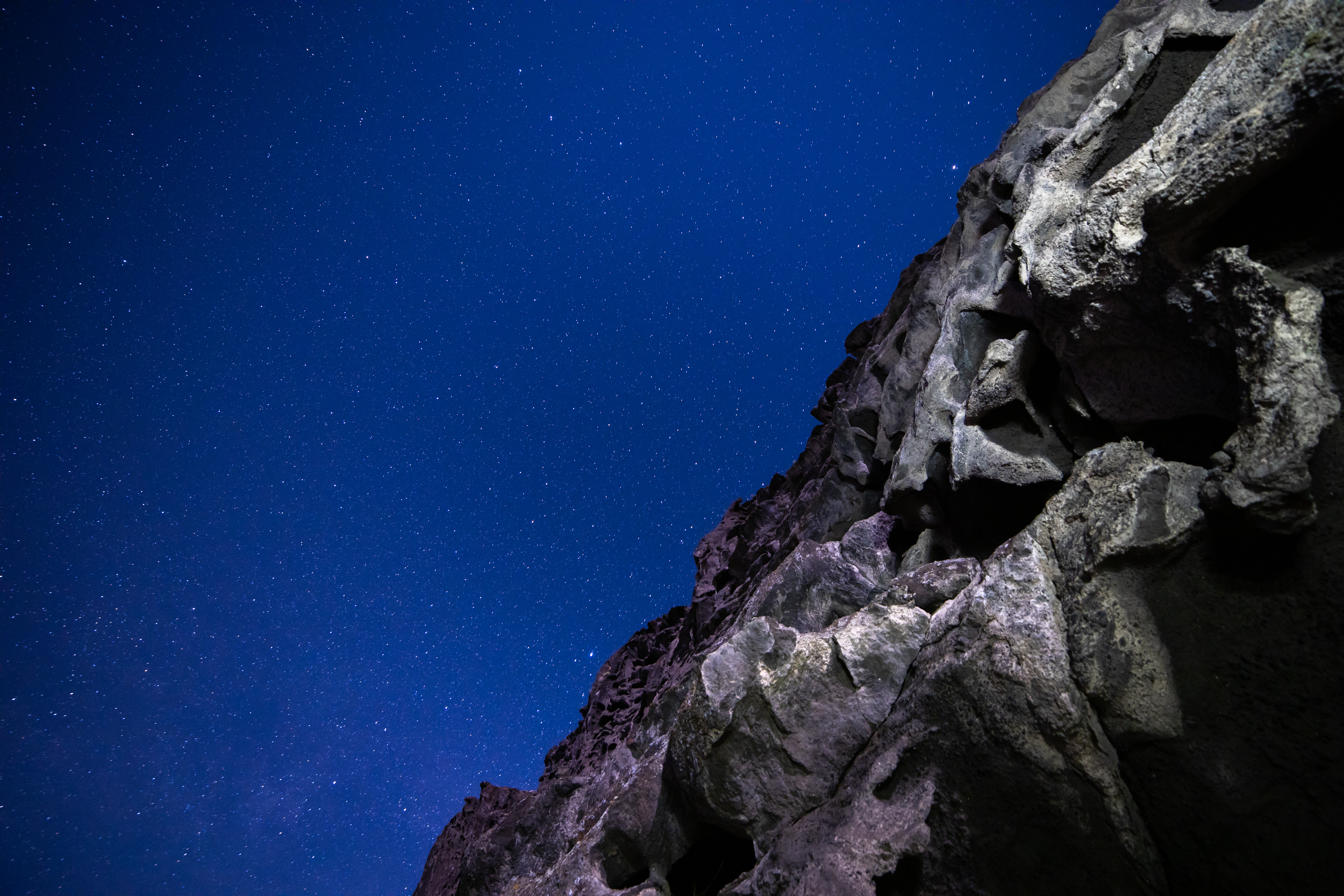 Download mobile wallpaper Rocks, Stones, Starry Sky, Nature, Stars, Night for free.