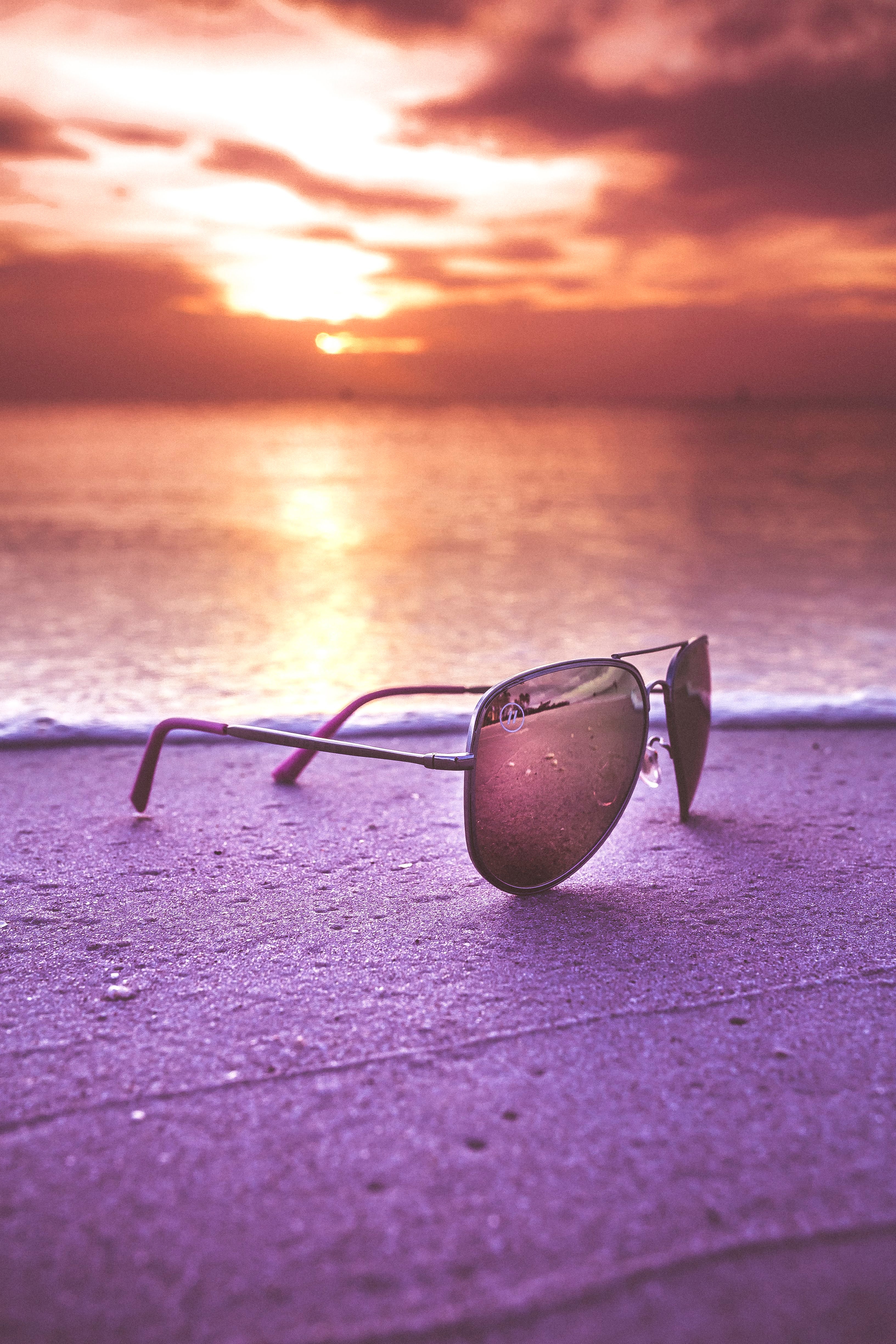 Download mobile wallpaper Sunglasses, Miscellanea, Glasses, Miscellaneous, Spectacles, Sunset, Sea for free.