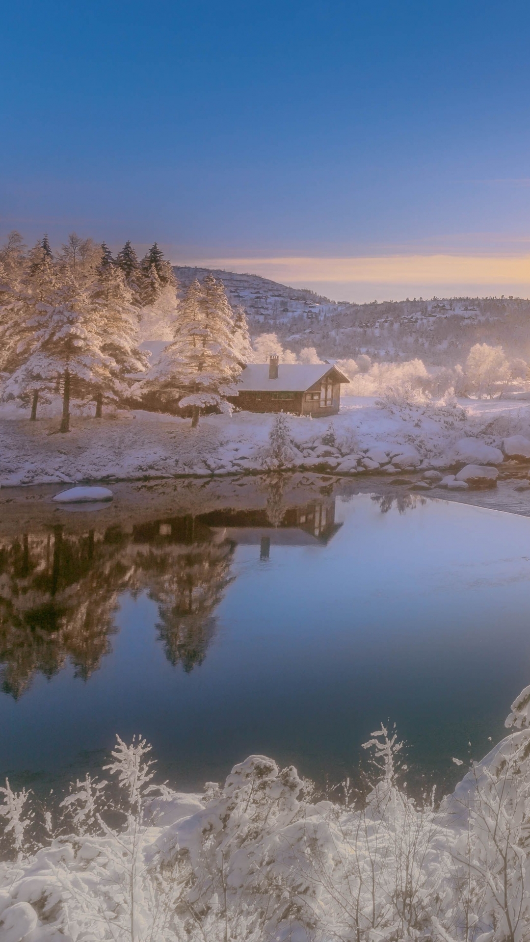 Download mobile wallpaper Landscape, Winter, Water, Sun, Snow, Reflection, Tree, River, Photography, Cabin for free.