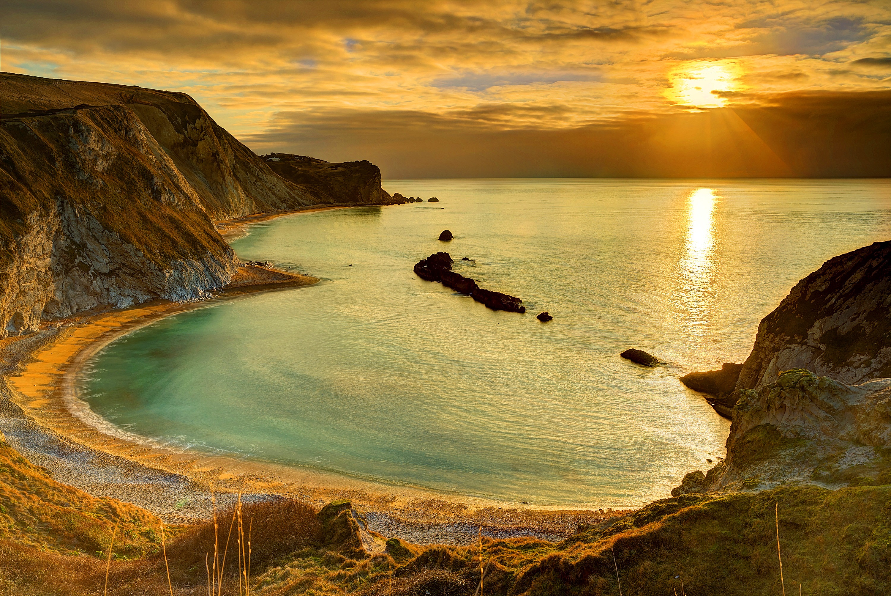 Download mobile wallpaper Sunset, Sky, Sea, Sun, Beach, Horizon, Coast, Ocean, Earth for free.