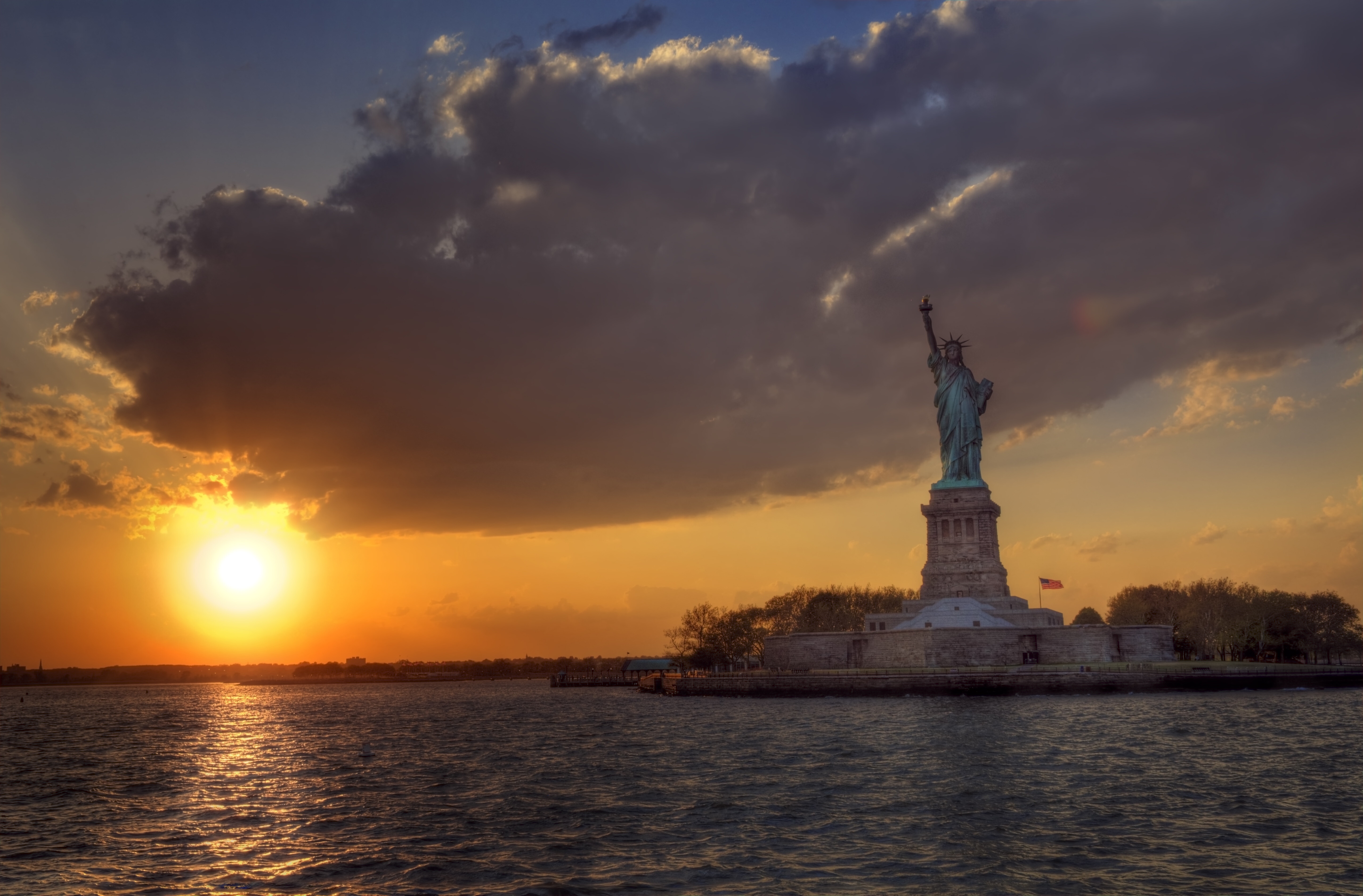 Free download wallpaper Sun, Statue Of Liberty, Usa, Sunrise, Man Made on your PC desktop