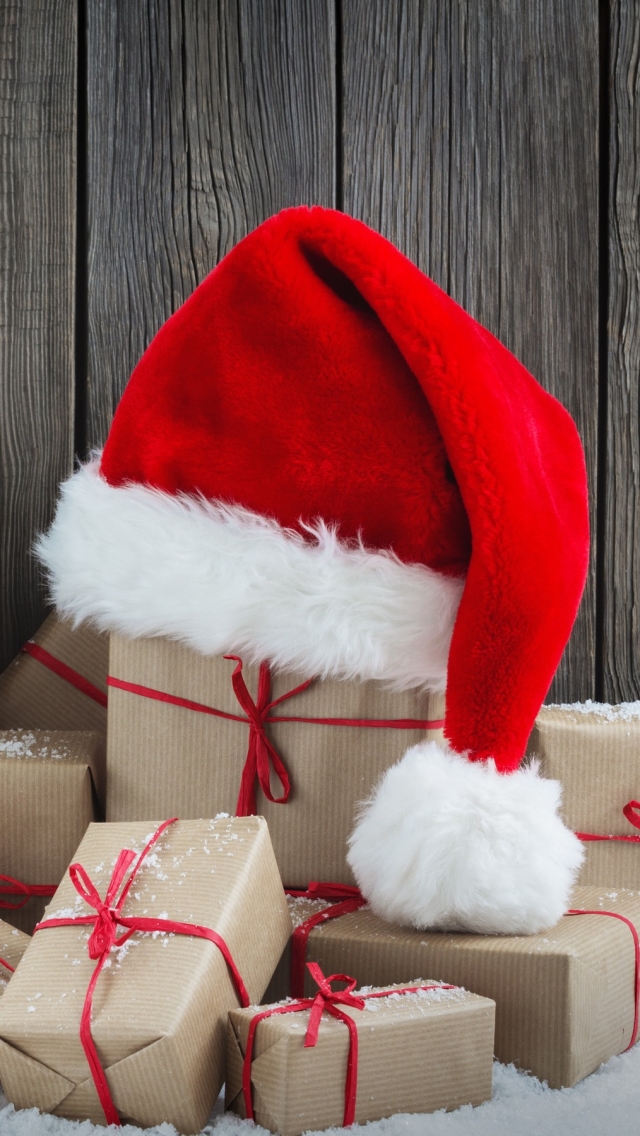 Скачать картинку Рождество, Подарок, Подарки, Праздничные, Шляпа Санты в телефон бесплатно.