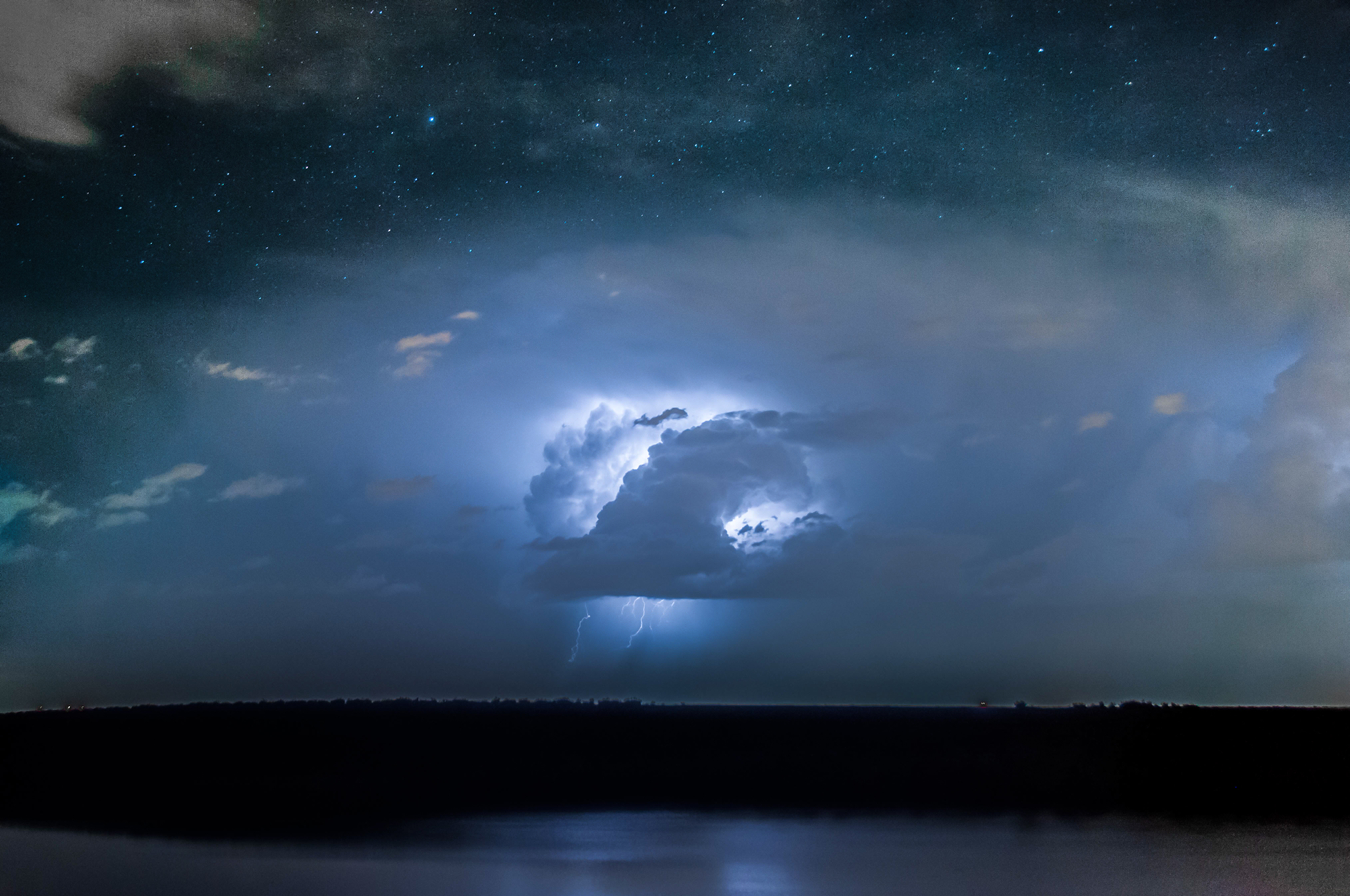 Download mobile wallpaper Sky, Lightning, Starry Sky, Earth, Storm, Cloud for free.