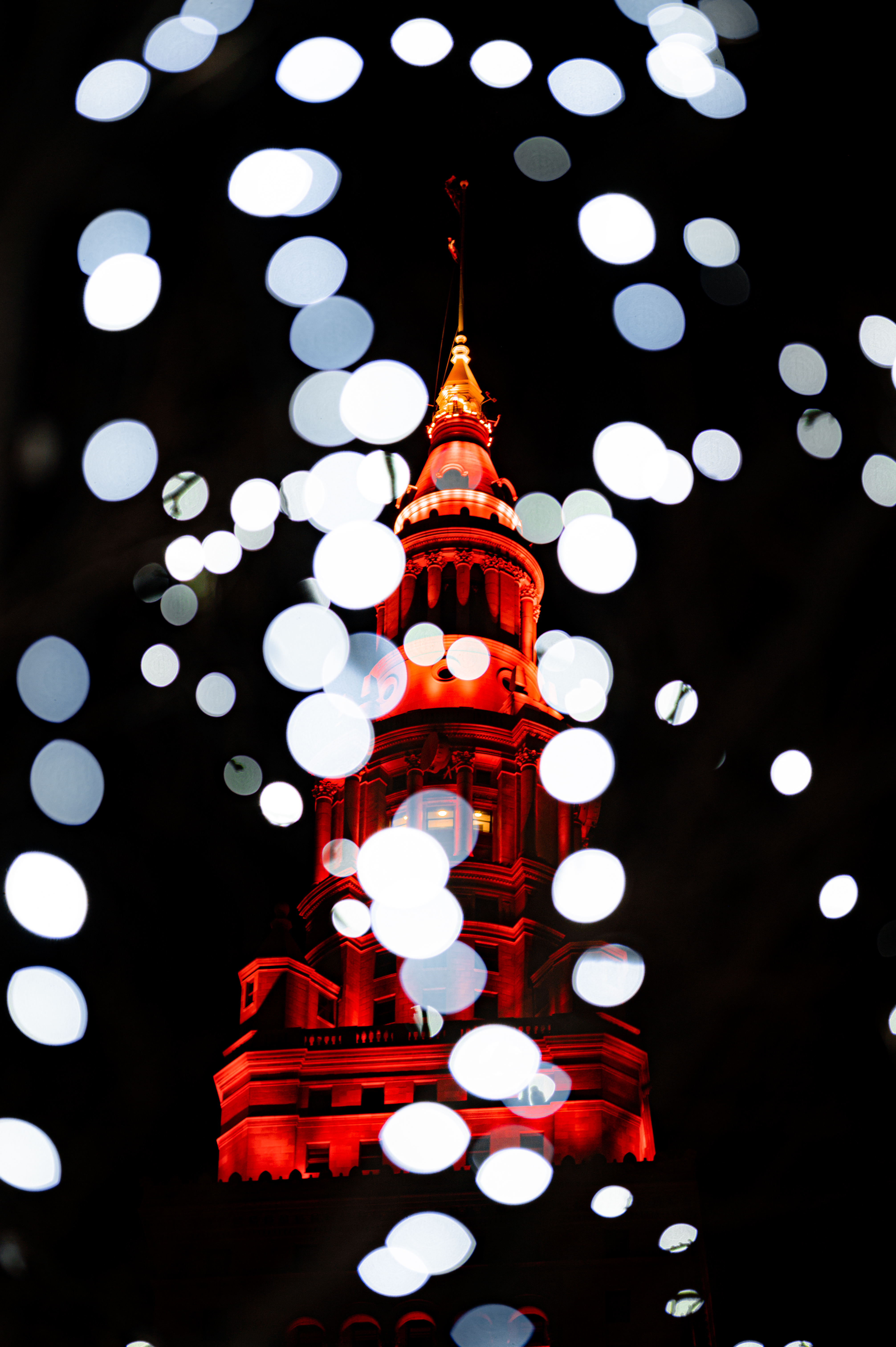 Download mobile wallpaper Glare, Cities, Building, Lights, Boquet, Night, Bokeh for free.