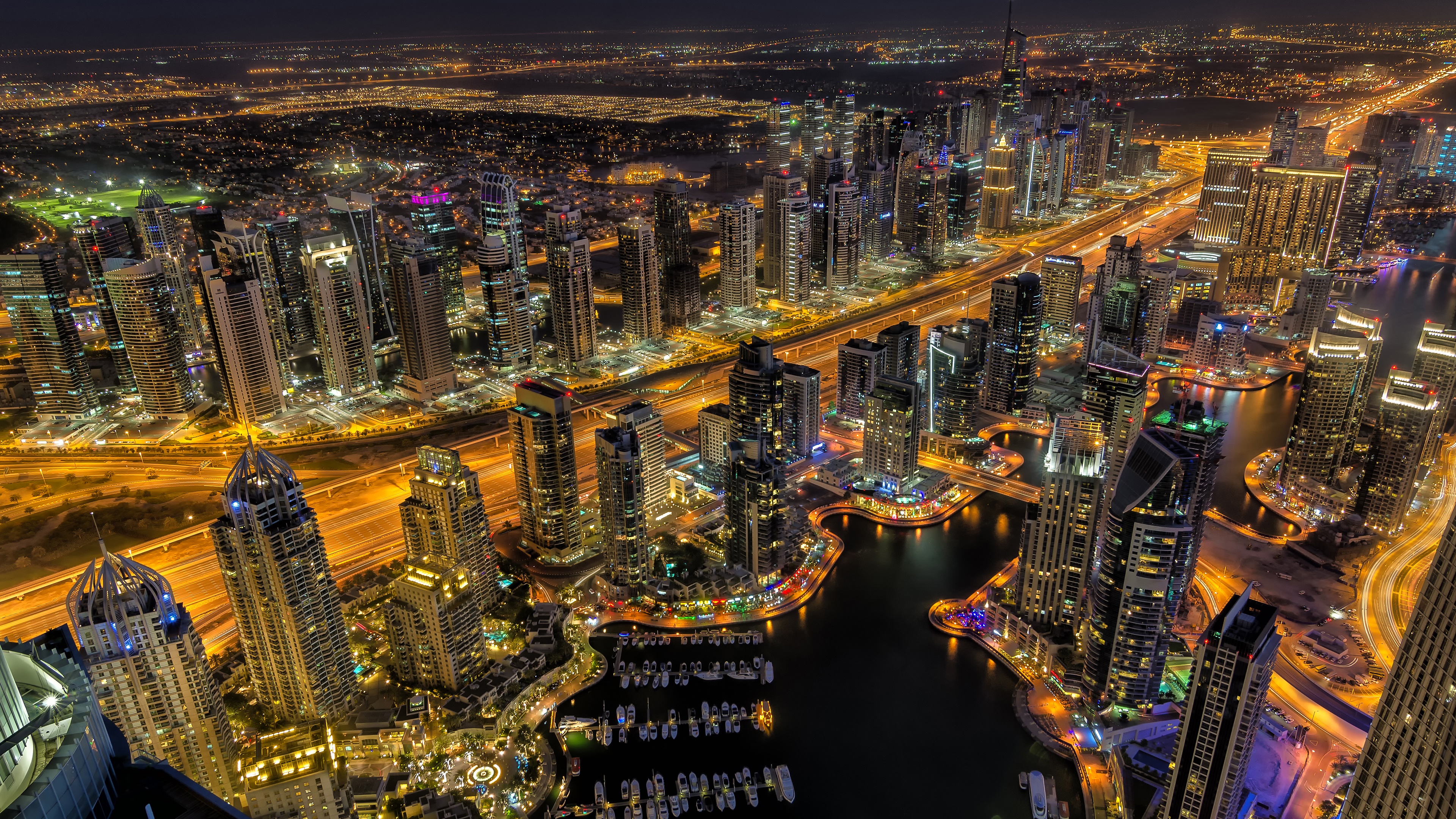 Скачать картинку Города, Ночь, Город, Свет, Дубай, Городской Пейзаж, Небоскрёб, Сделано Человеком в телефон бесплатно.