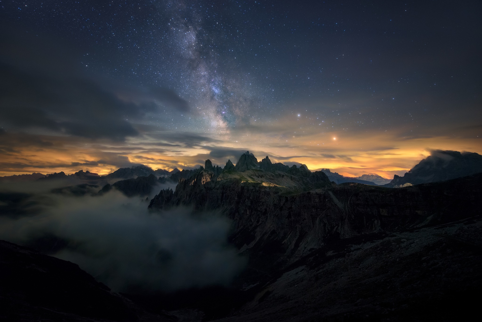 Download mobile wallpaper Landscape, Nature, Sky, Stars, Night, Mountain, Fog, Starry Sky, Earth, Milky Way for free.