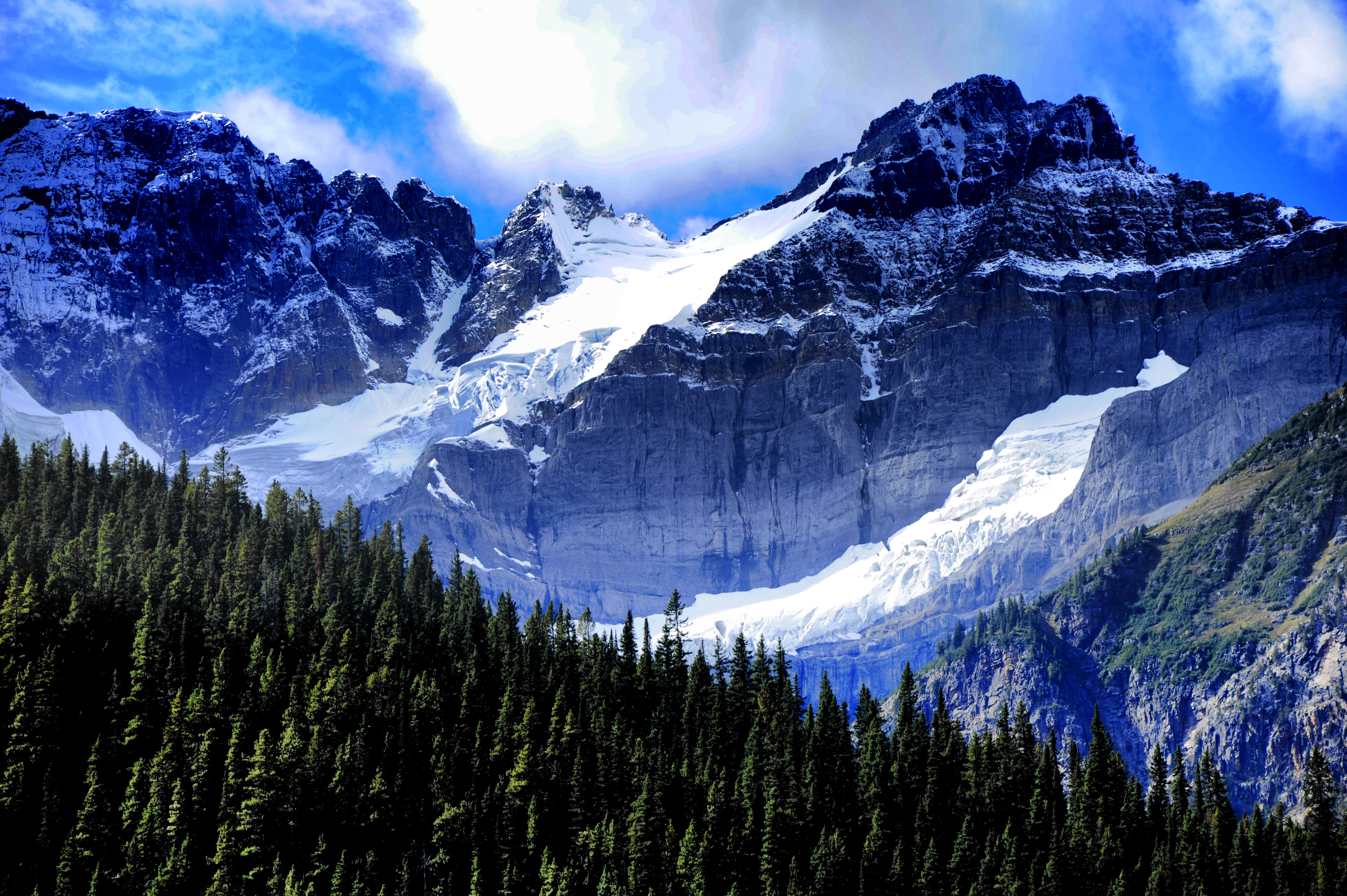 Free download wallpaper Nature, Trees, Sky, Snow, Spruce, Fir, Snow Covered, Snowbound, Mountains on your PC desktop