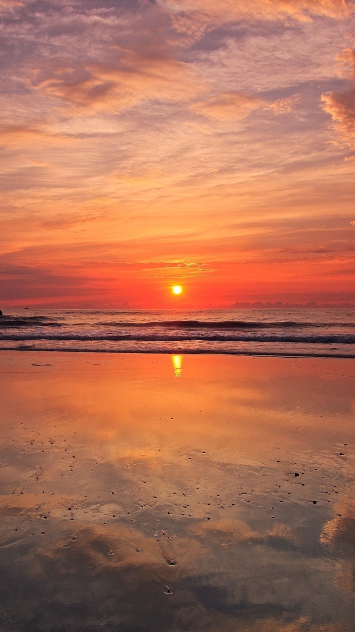 Download mobile wallpaper Sunset, Sky, Sun, Twilight, Beach, Reflection, Earth, Dusk, Evening, Seashore for free.