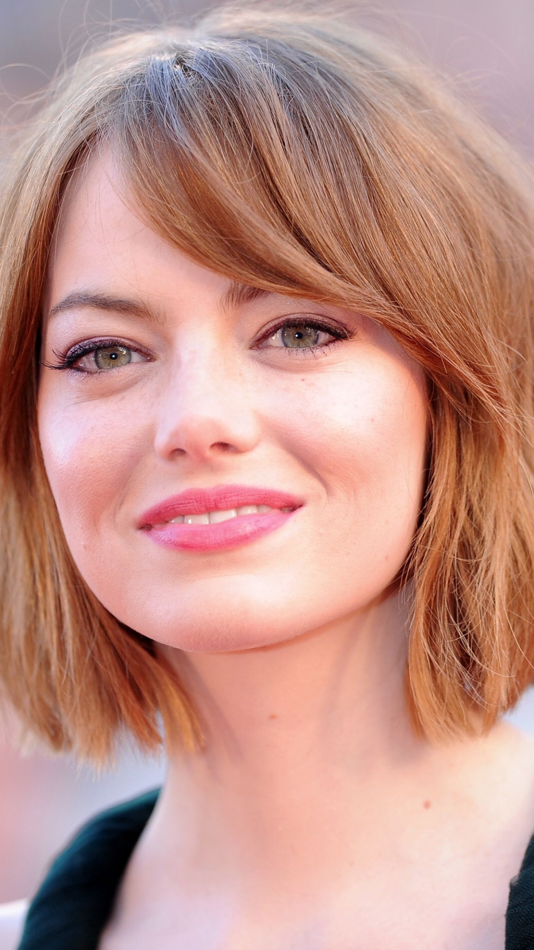 Download mobile wallpaper Emma Stone, Smile, Redhead, Face, American, Celebrity, Short Hair, Actress, Depth Of Field for free.