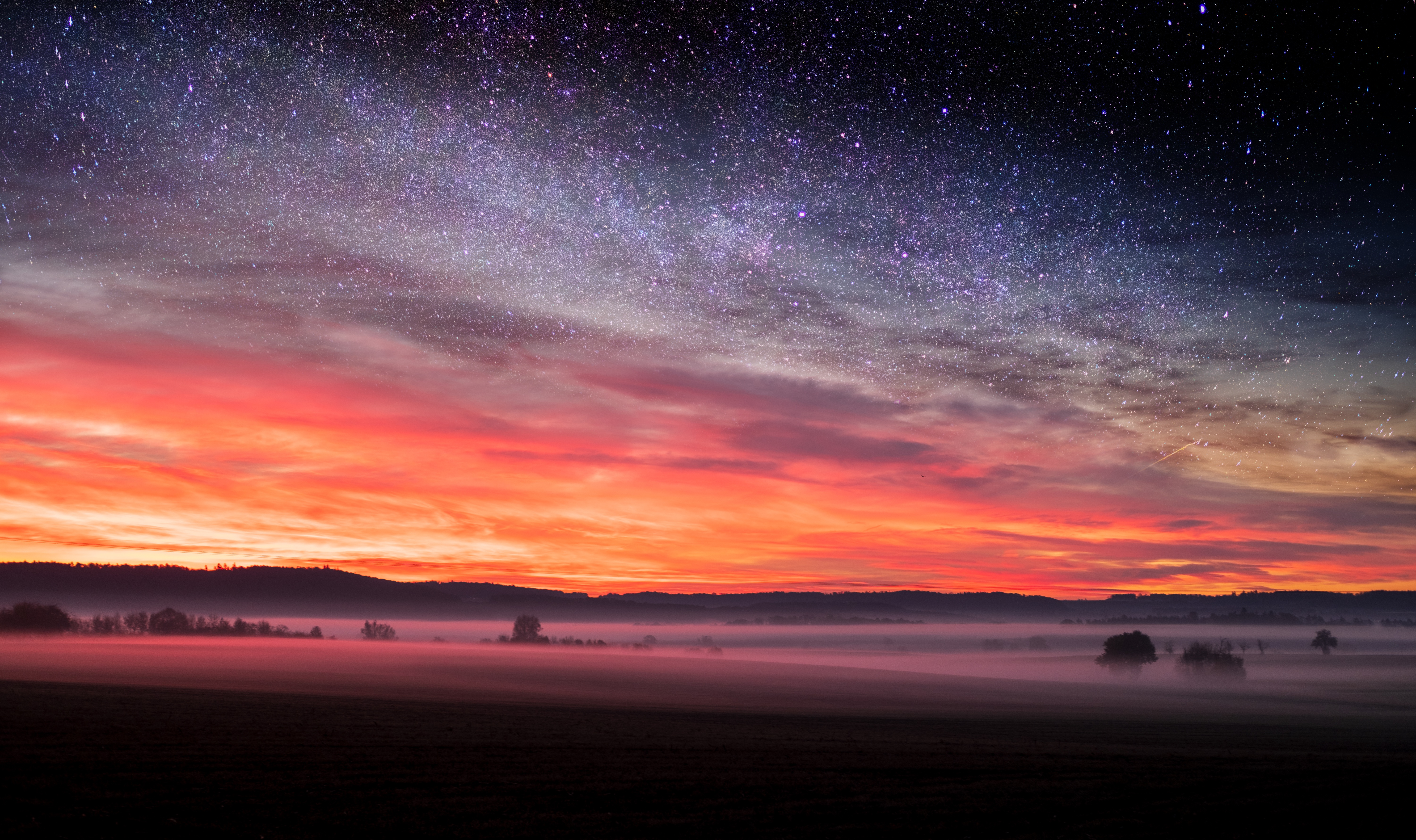 Download mobile wallpaper Field, Evening, Fog, Starry Sky, Autumn, Nature, Landscape for free.