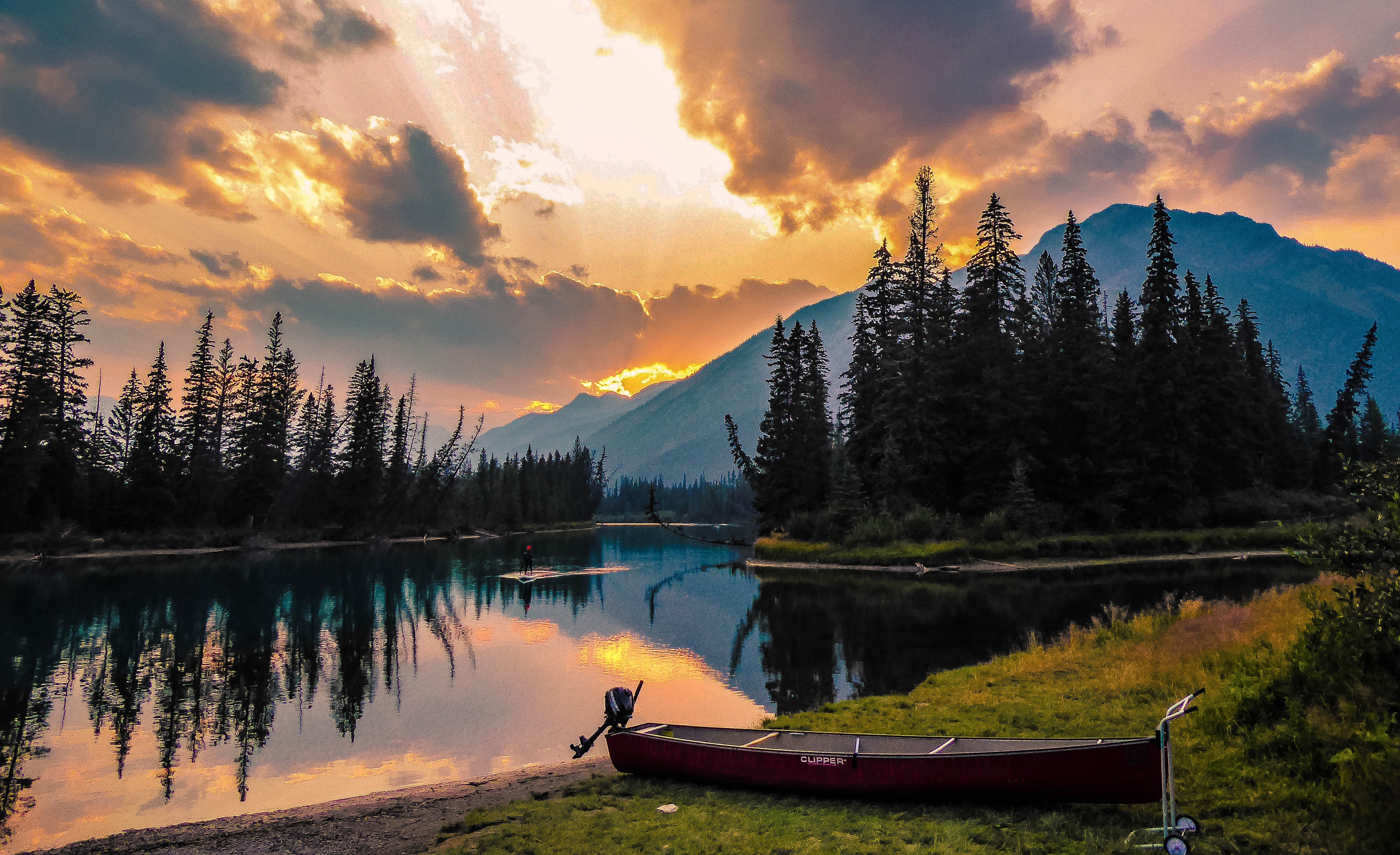 Download mobile wallpaper Sunset, Mountain, Boat, River, Banff National Park, Vehicles for free.