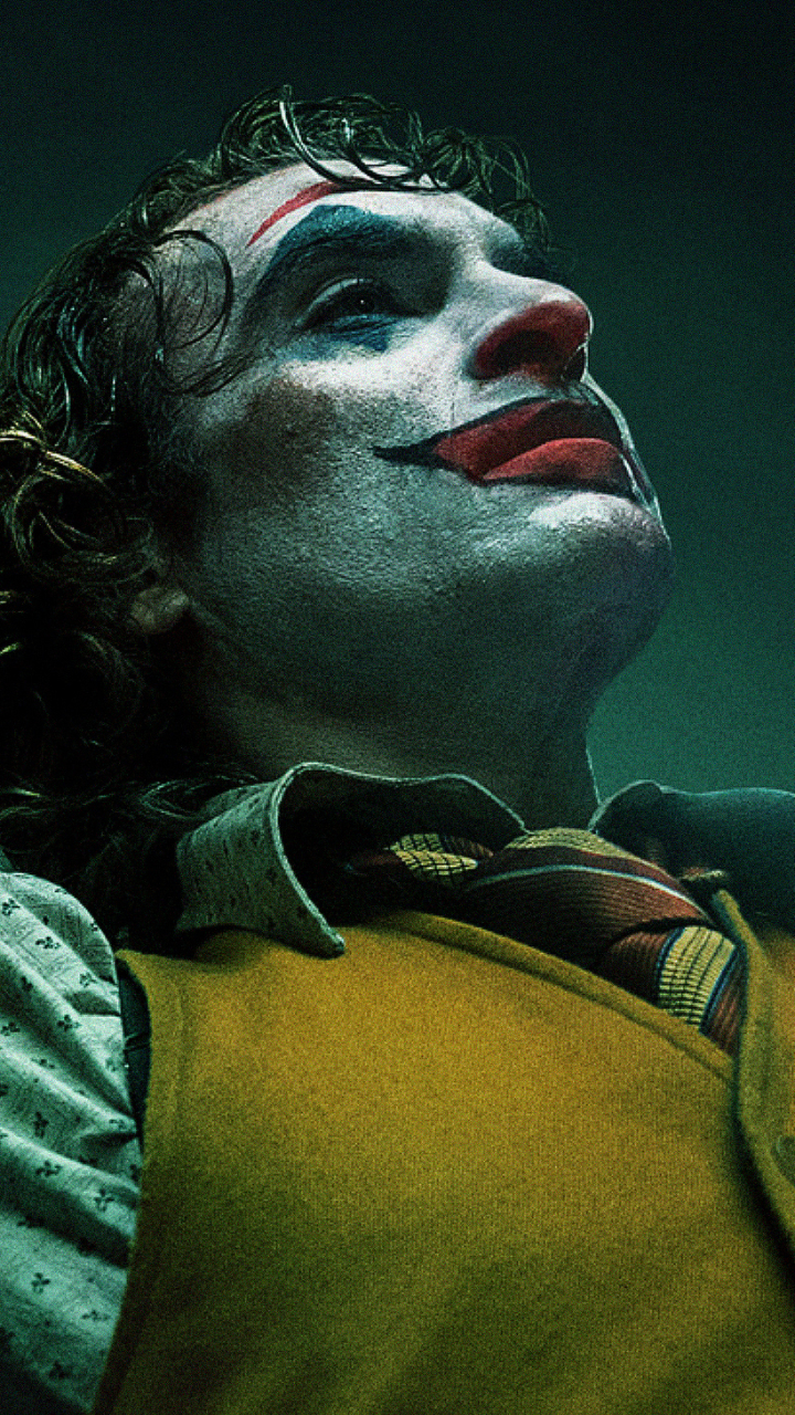 Handy-Wallpaper Joker, Filme, Joaquin Phoenix kostenlos herunterladen.