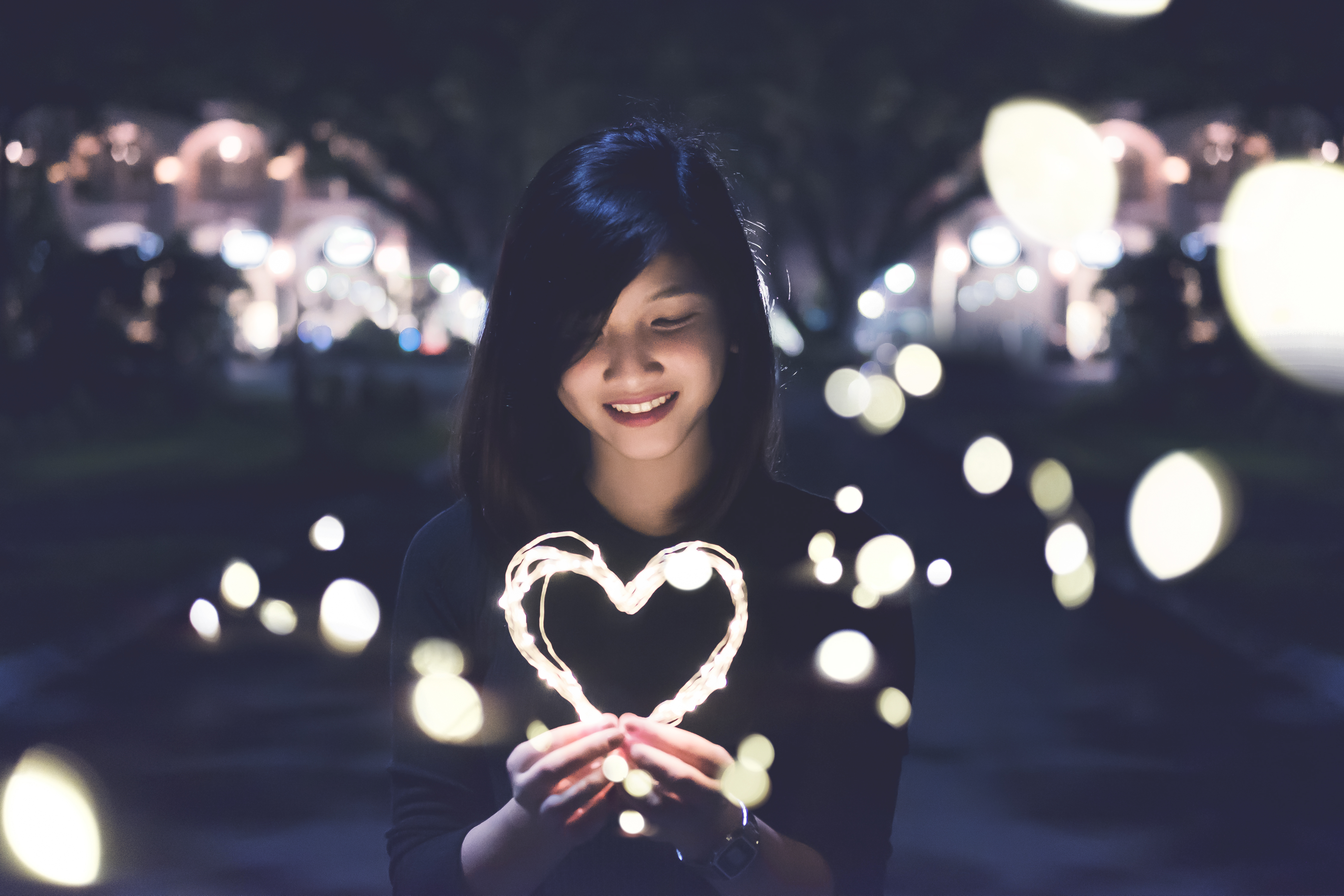 Download mobile wallpaper Night, Light, Smile, Heart, Brunette, Model, Women, Asian for free.