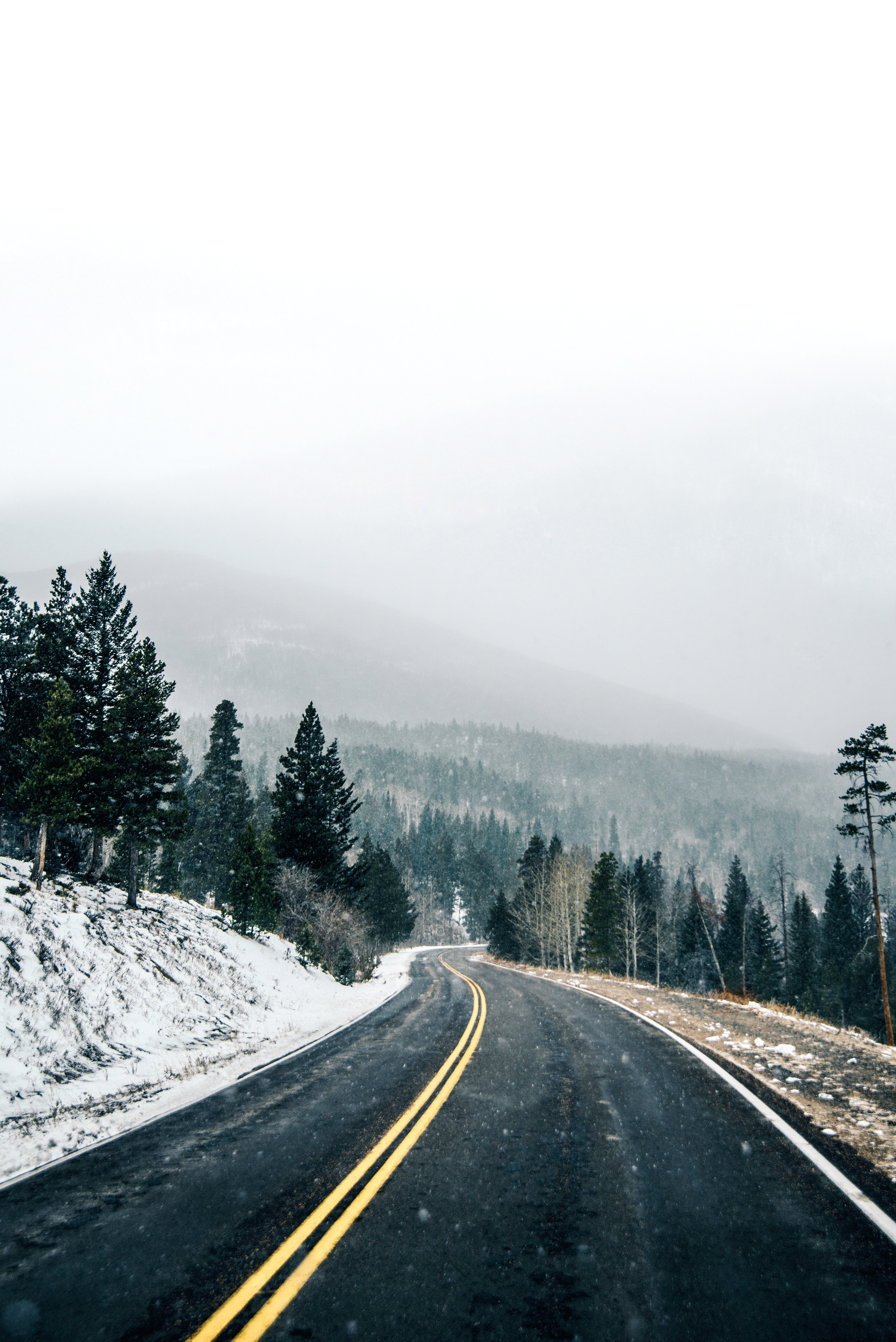 Download mobile wallpaper Road, Forest, Snow, Winter, Asphalt, Nature for free.