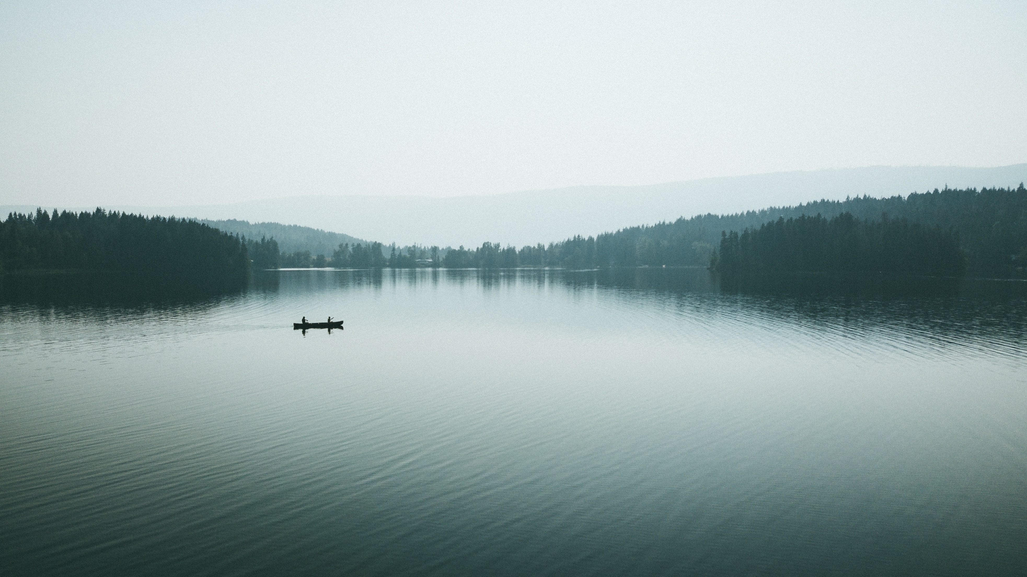 Download mobile wallpaper Fog, Canoe, Nature, Lake, Boat, Silhouettes for free.