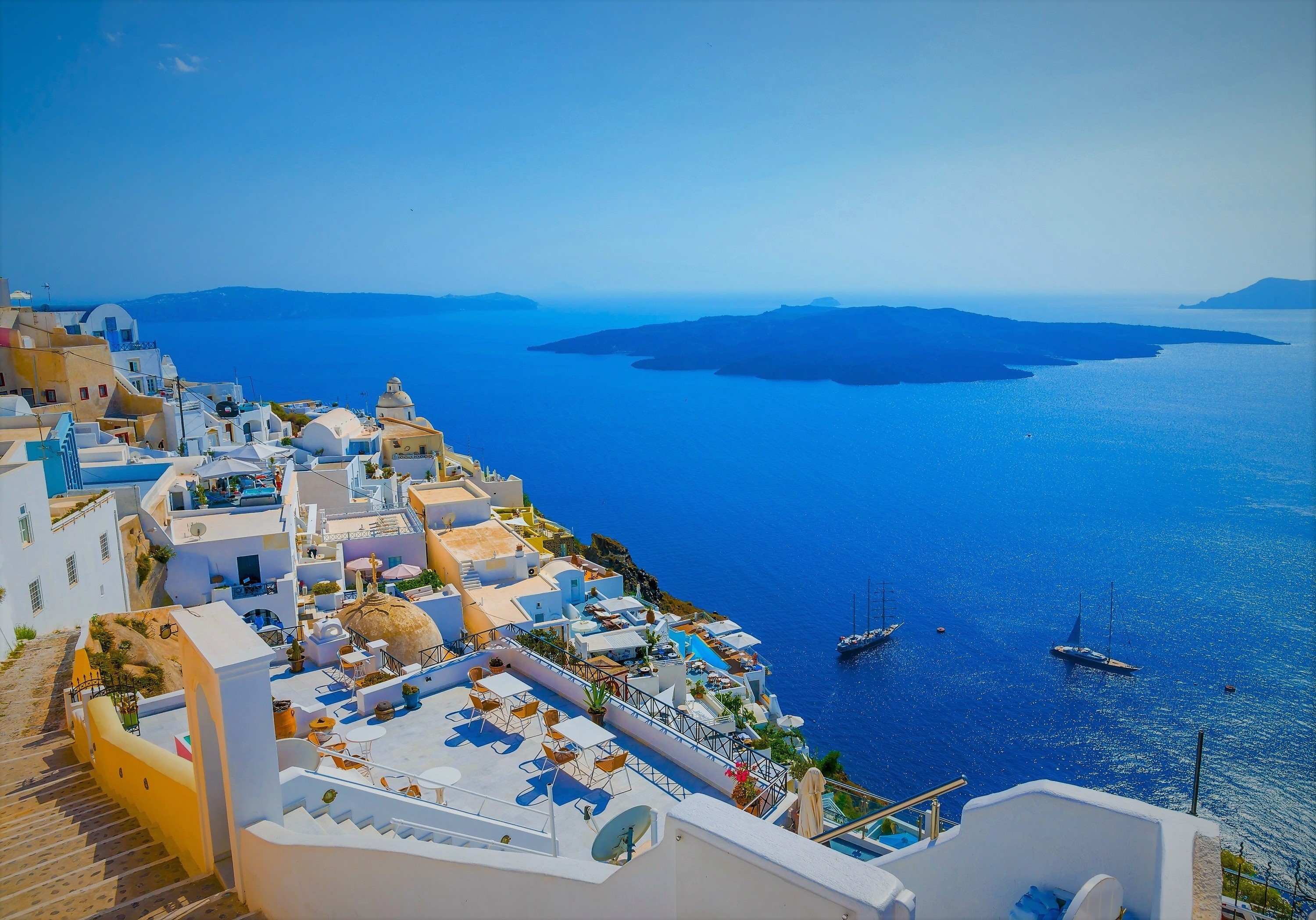 Download mobile wallpaper Sea, Horizon, Ocean, House, Greece, Town, Santorini, Man Made for free.