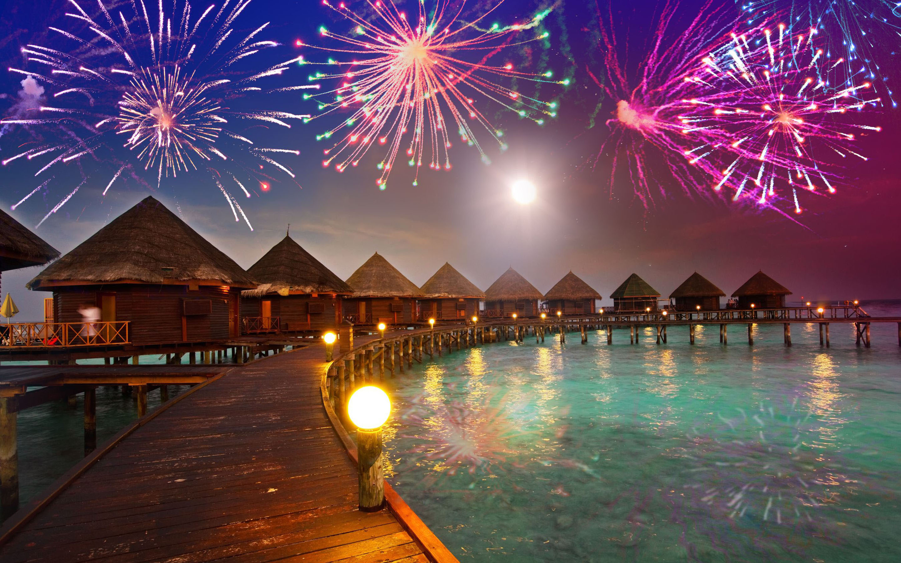 Скачать картинку Новый Год, Красочный, Фейерверк, Мальдивы, Фотографии в телефон бесплатно.