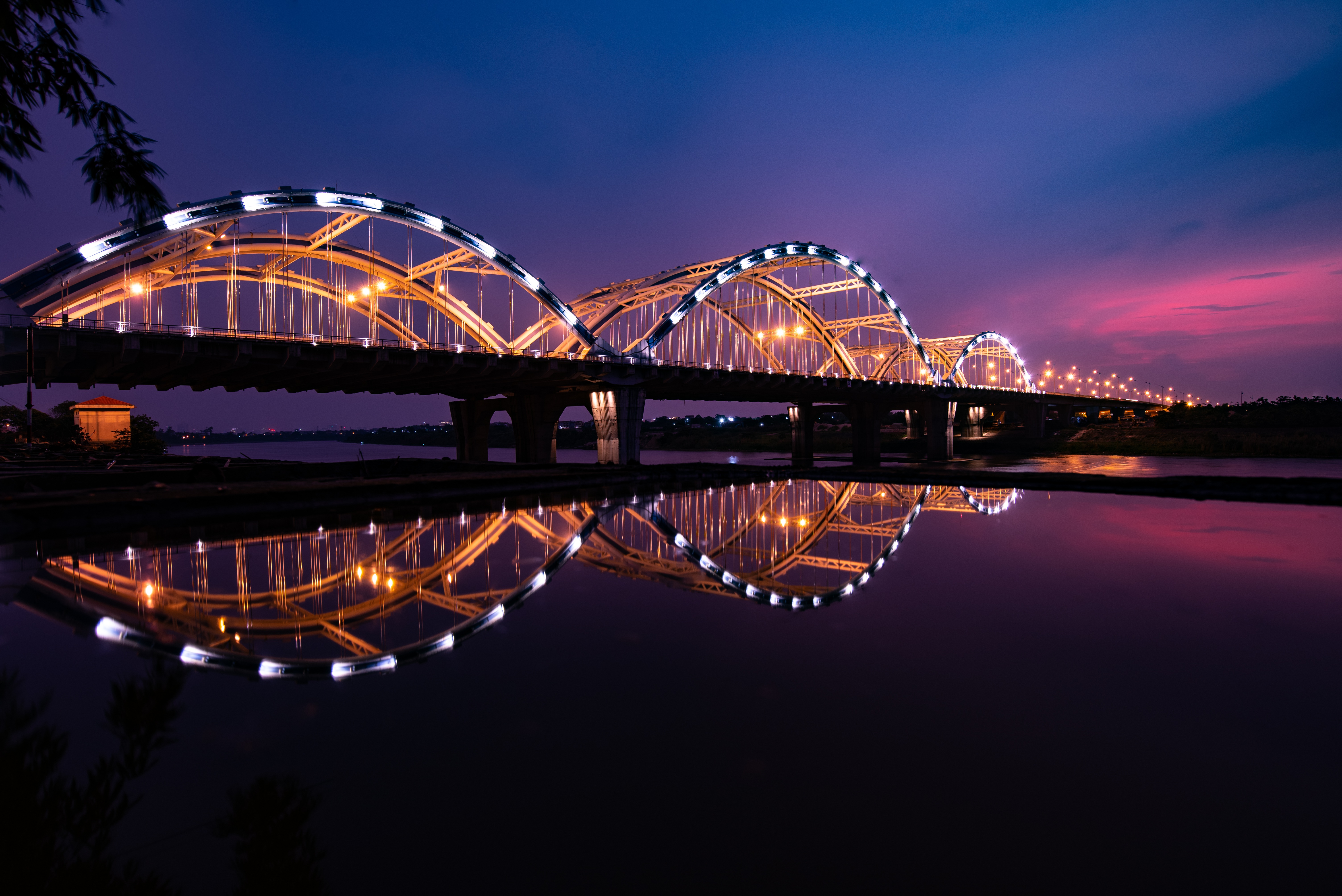 Download mobile wallpaper Bridges, Night, Reflection, Bridge, Vietnam, Man Made for free.