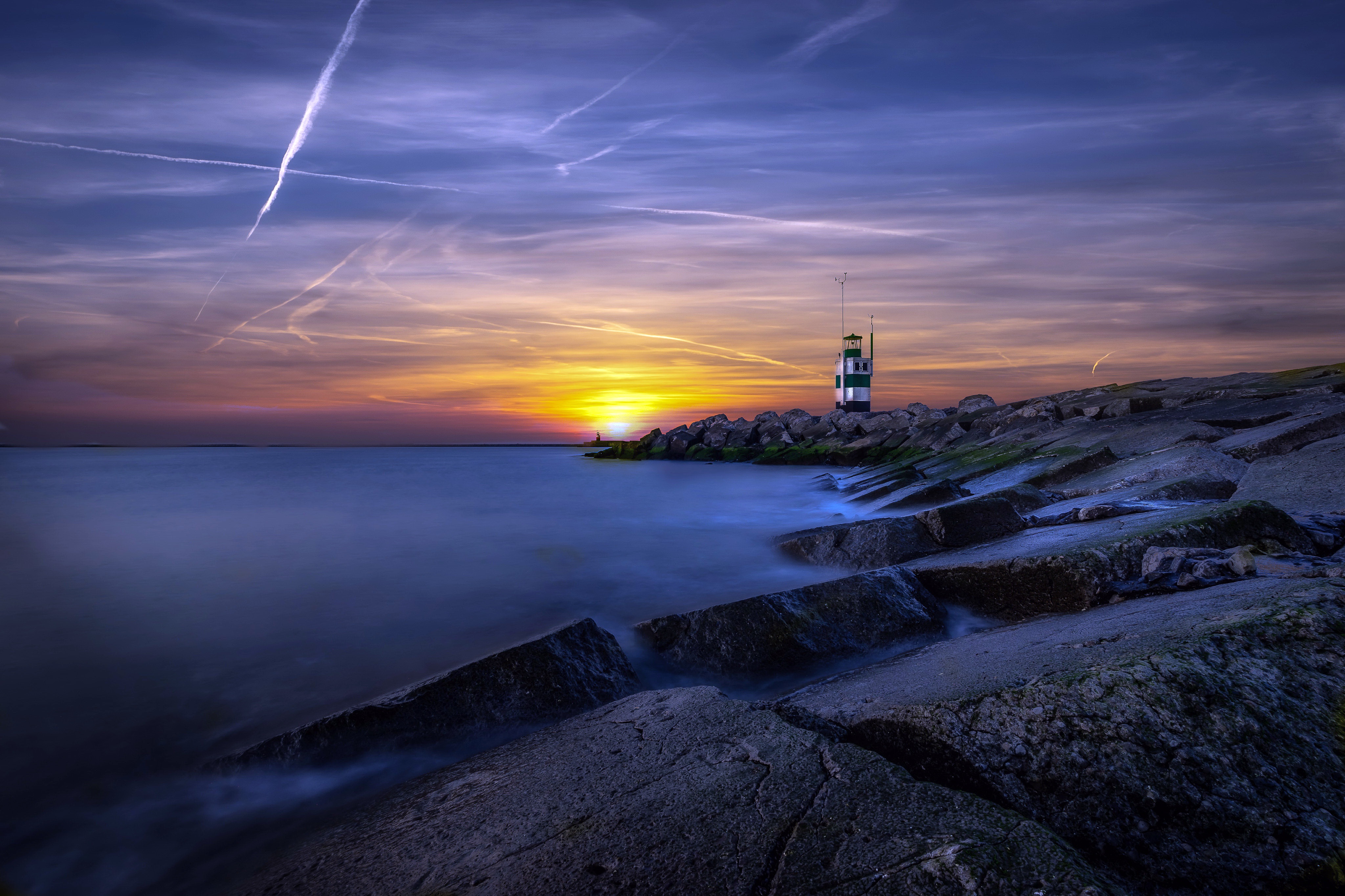 Free download wallpaper Sunset, Coast, Lighthouse, Man Made on your PC desktop