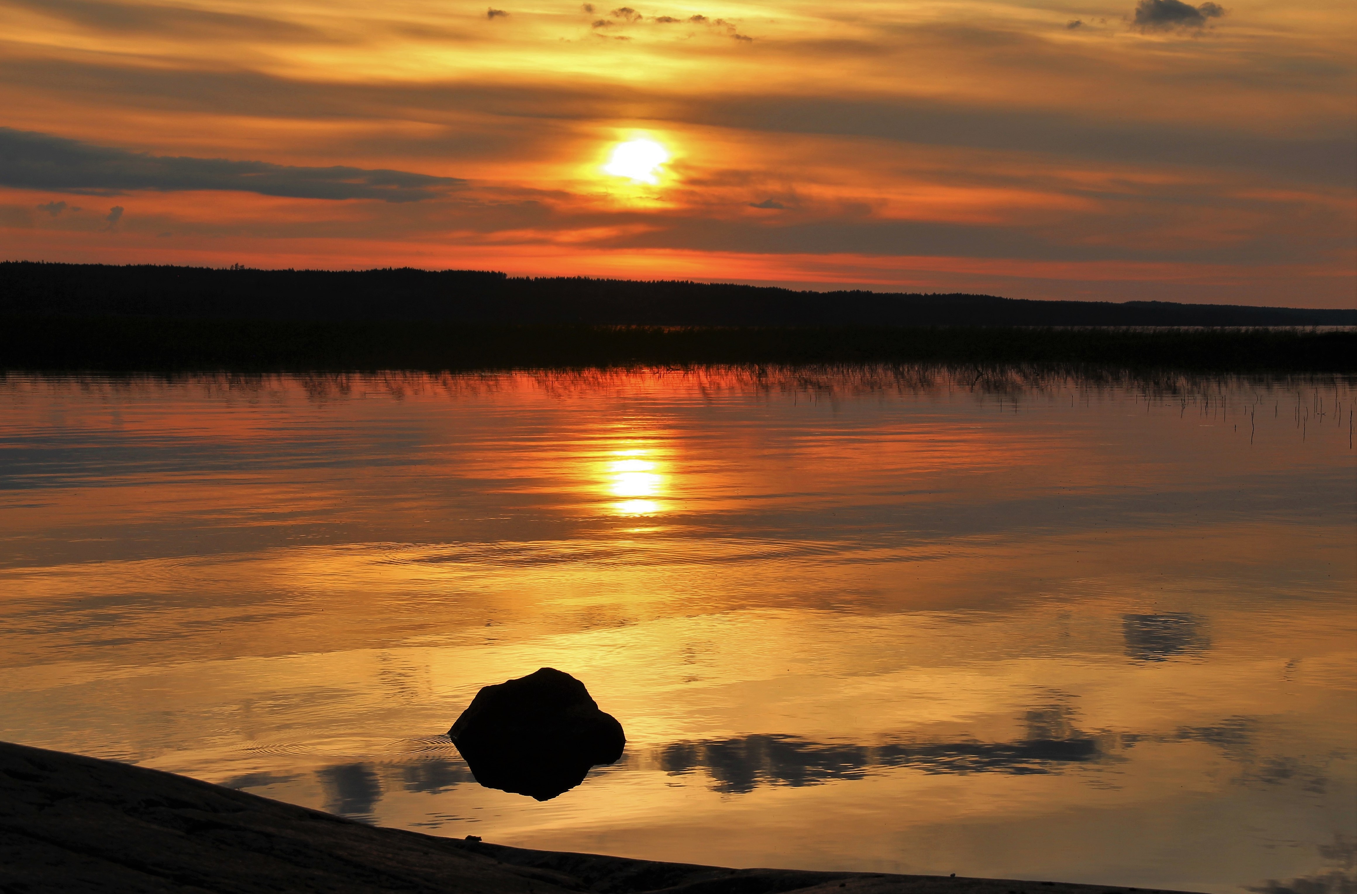Download mobile wallpaper Nature, Reflection, Stones, Sunset, Lake, Sun for free.