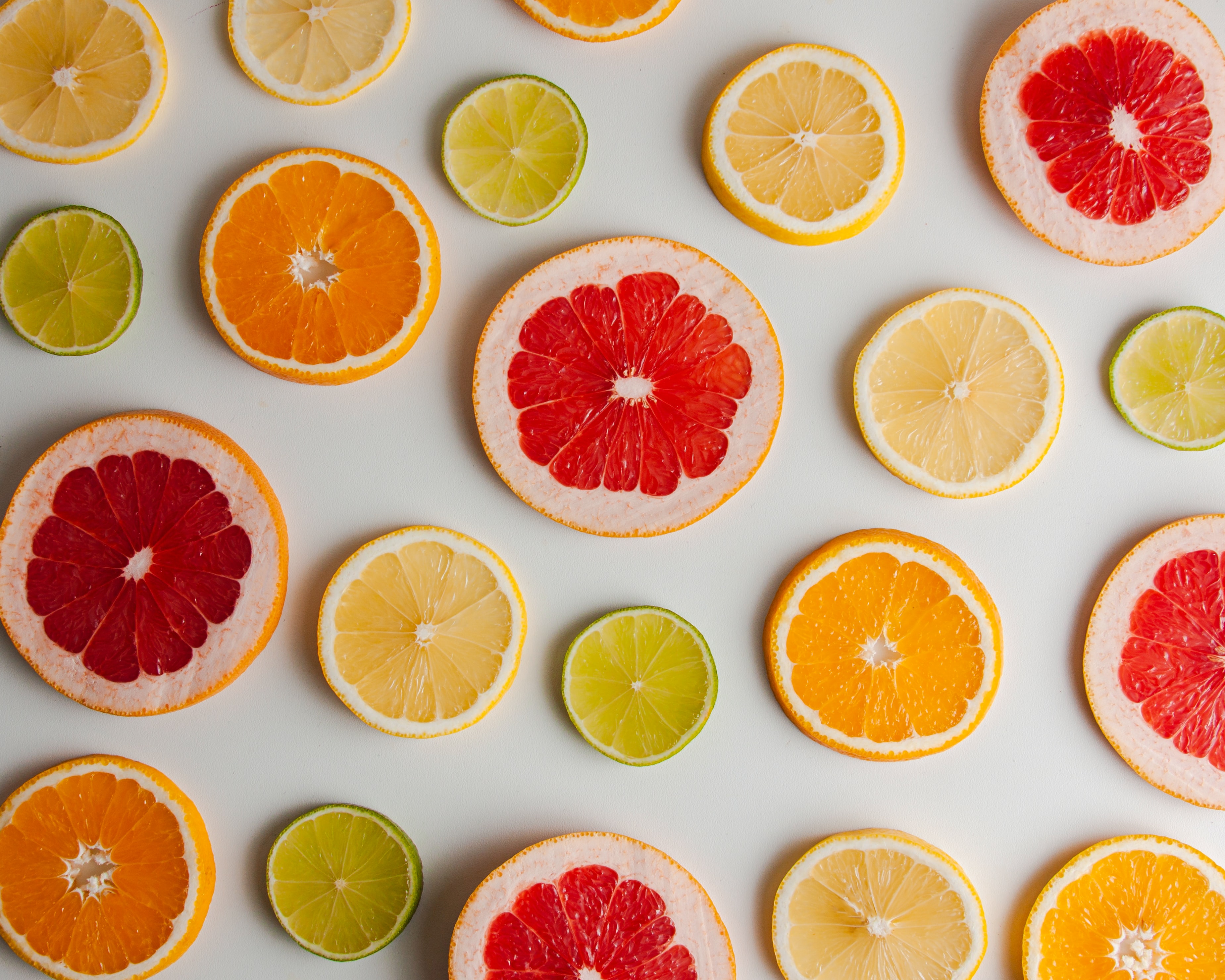 95529 скачать картинку лимон, фрукты, еда, лайм, апельсин, дольки, грейпфрут, оранжевые - обои и заставки бесплатно