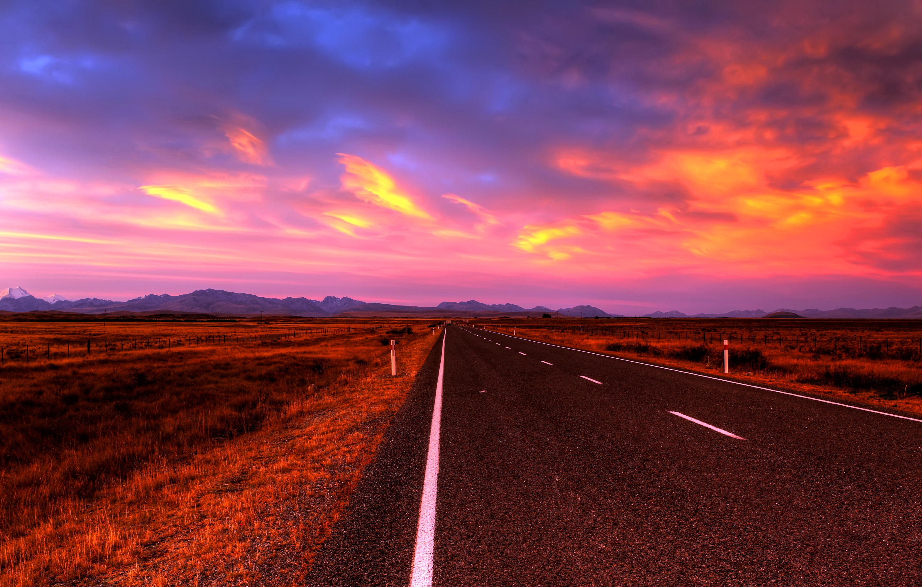 Download mobile wallpaper Landscape, Sunset, Sky, Road, Man Made for free.