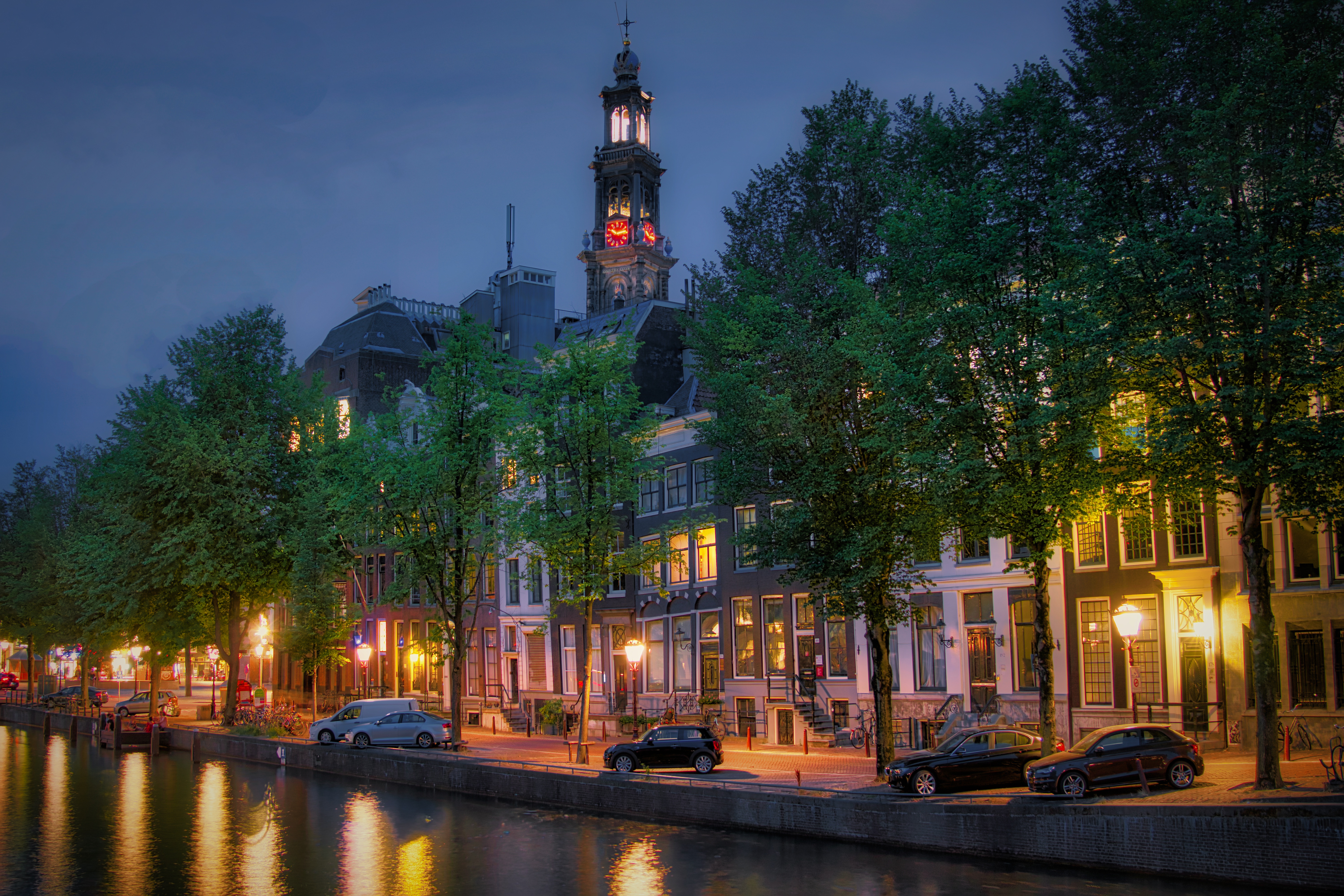 Free download wallpaper Cities, Clock, City, Car, House, Evening, Tower, Netherlands, Amsterdam, Man Made, Canal on your PC desktop