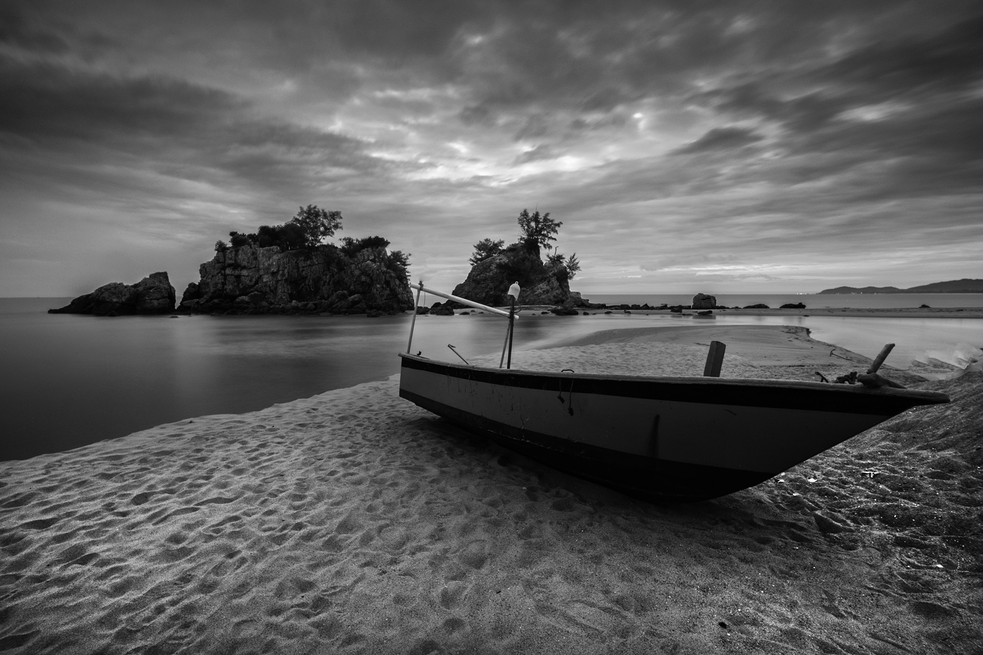 Download mobile wallpaper Landscape, Water, Sky, Sand, Ocean, Boat, Cloud, Photography, Black & White for free.