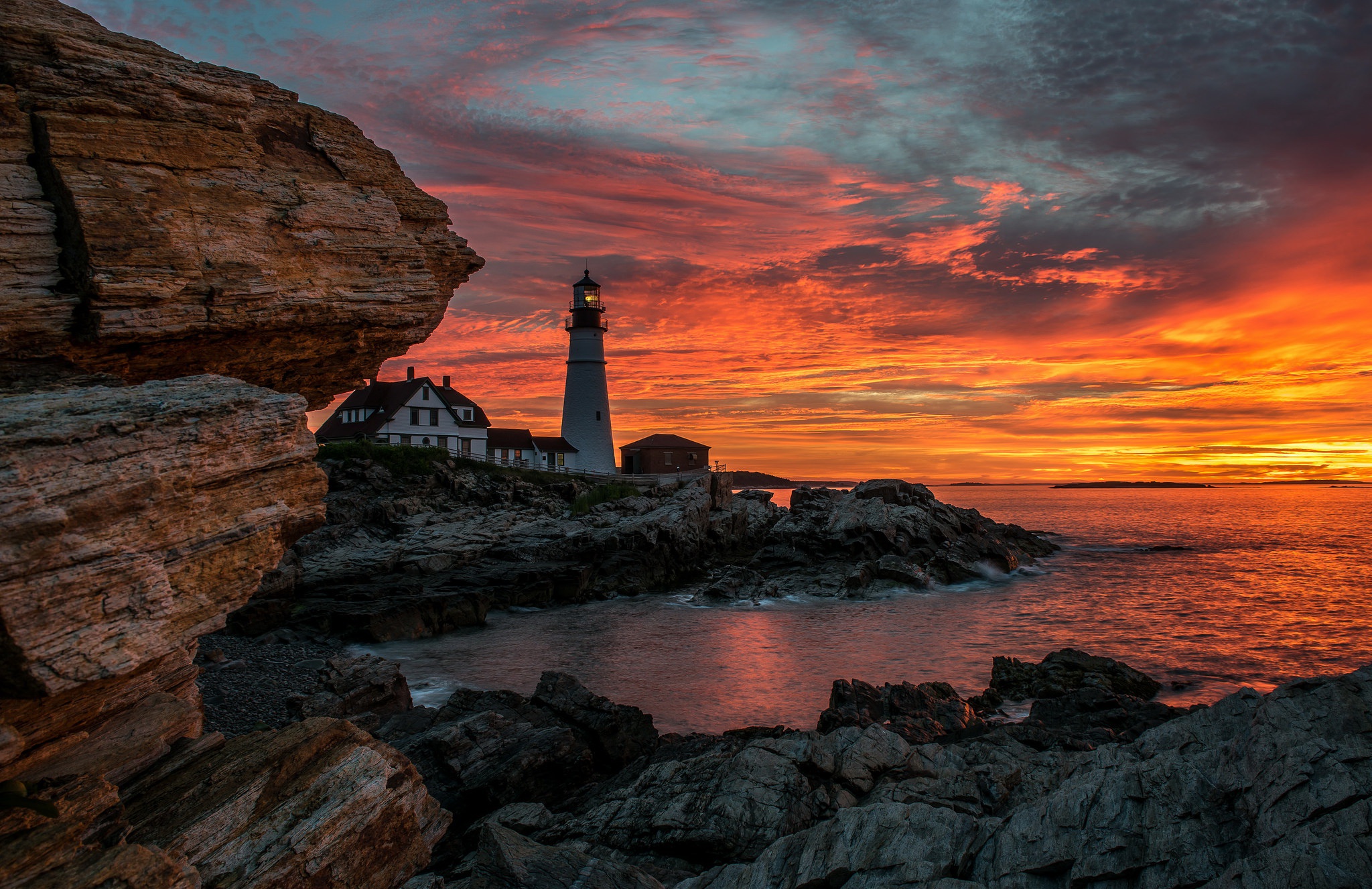 Download mobile wallpaper Sunset, Sky, Building, Horizon, Ocean, Lighthouse, Man Made for free.