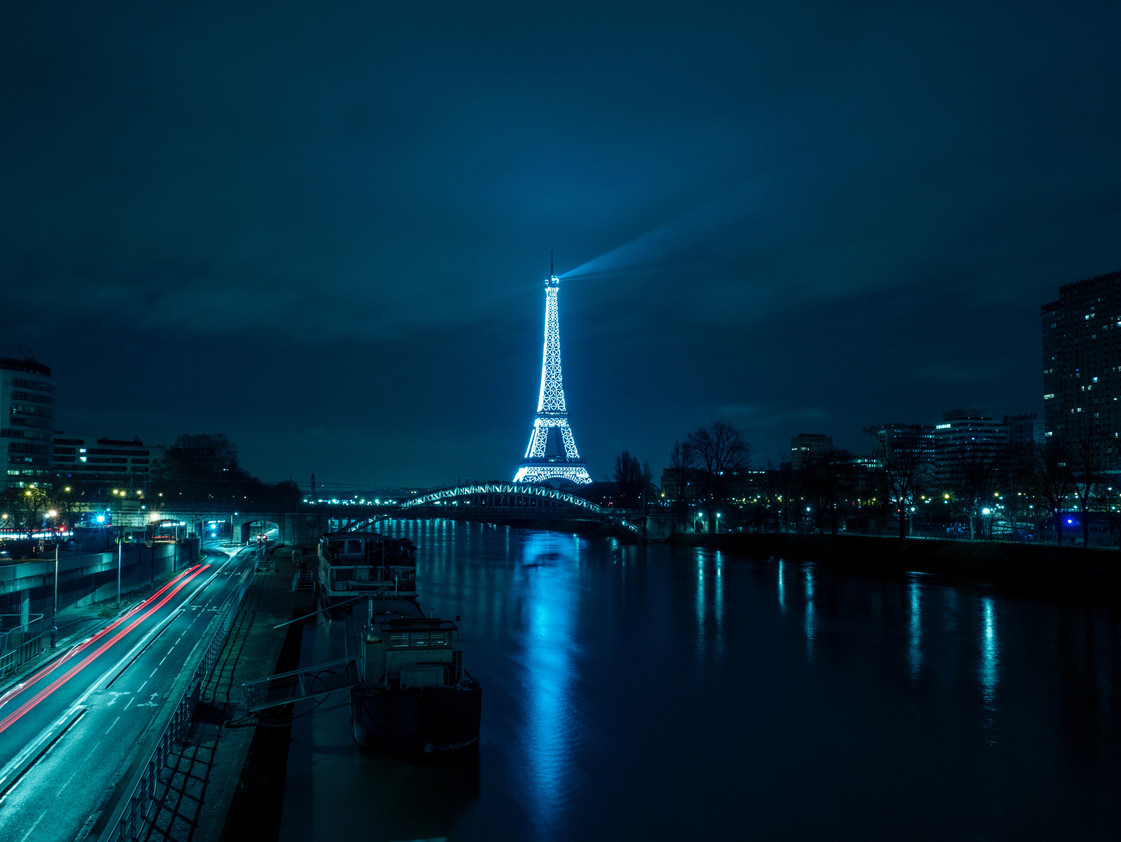 Free download wallpaper Night, Paris, Eiffel Tower, Monuments, City, Light, France, River, Monument, Man Made on your PC desktop