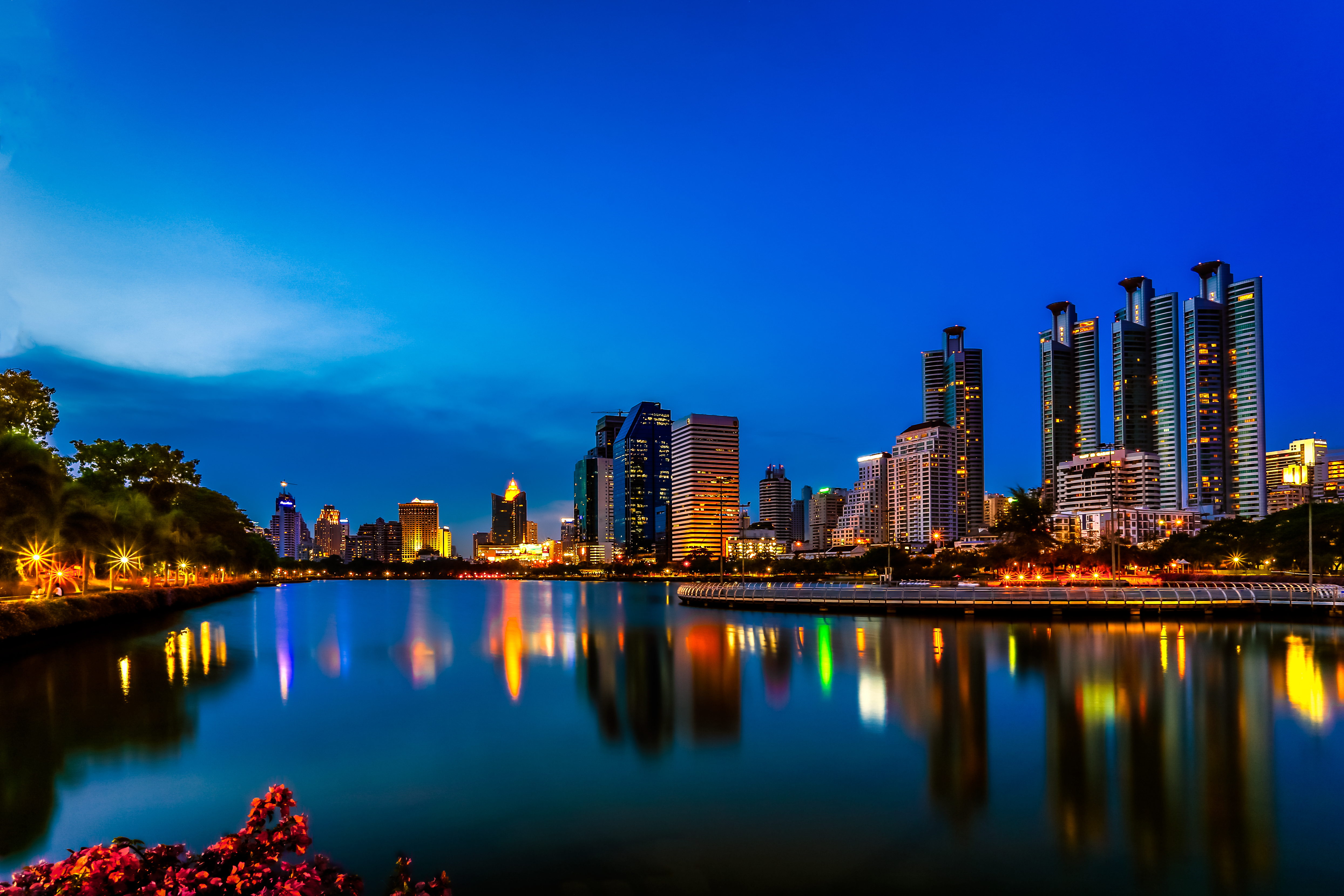 Download mobile wallpaper Cities, Night, City, Skyscraper, Building, Lake, Reflection, Light, Thailand, Bangkok, Man Made for free.