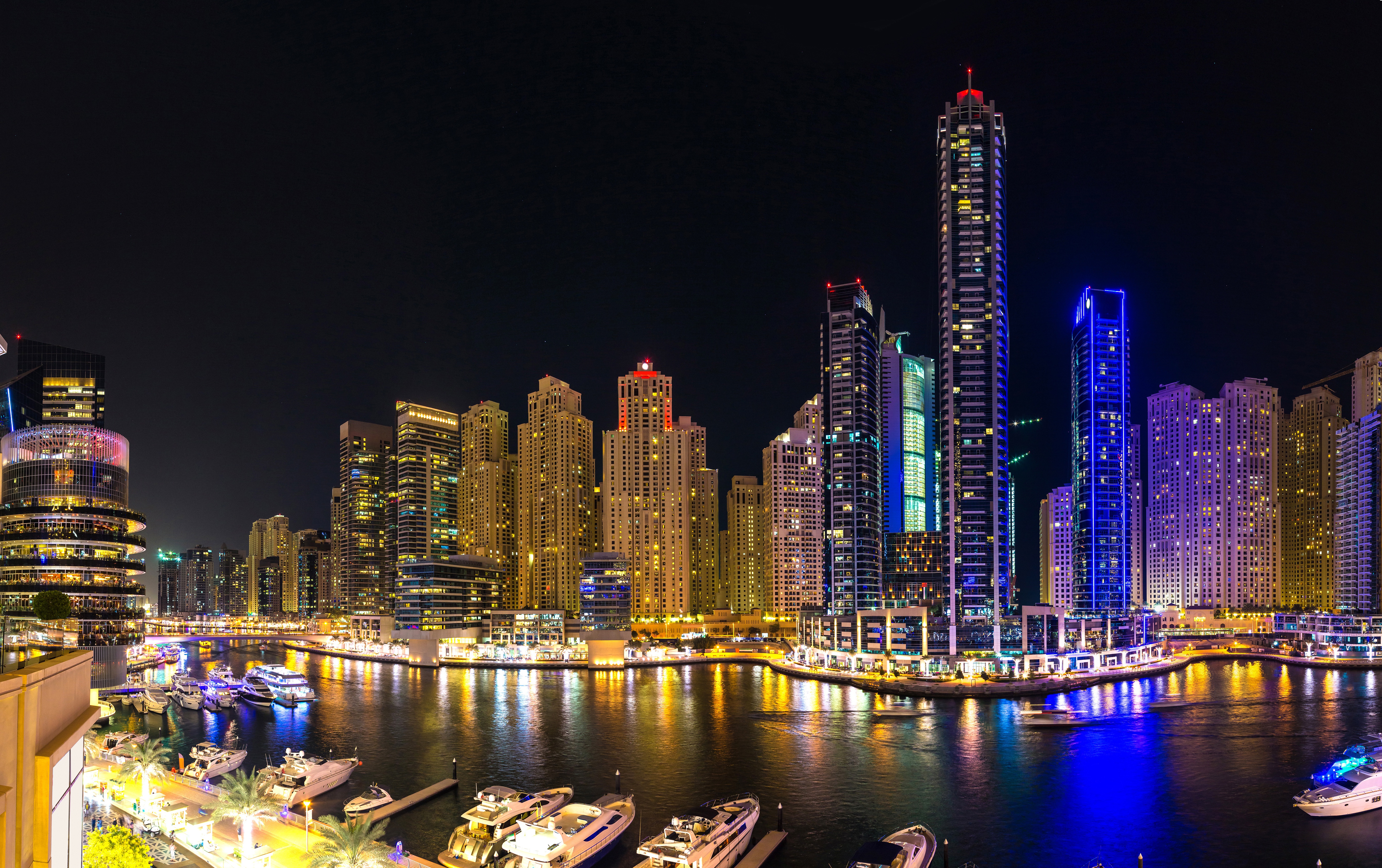 Download mobile wallpaper Cities, Night, City, Skyscraper, Building, Dubai, River, Man Made for free.