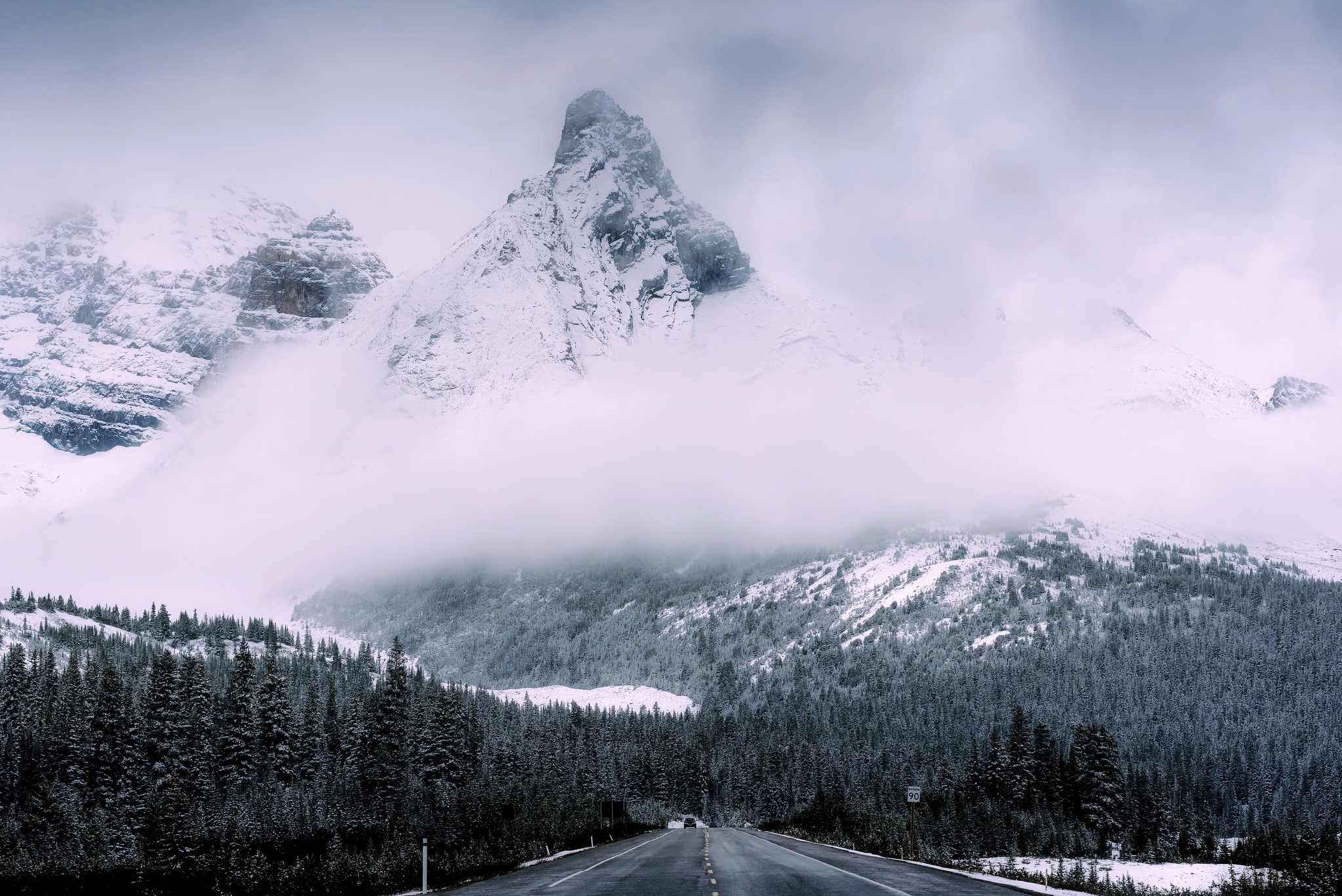 Download mobile wallpaper Winter, Nature, Snow, Mountain, Peak, Road, Forest, Fog, Man Made for free.