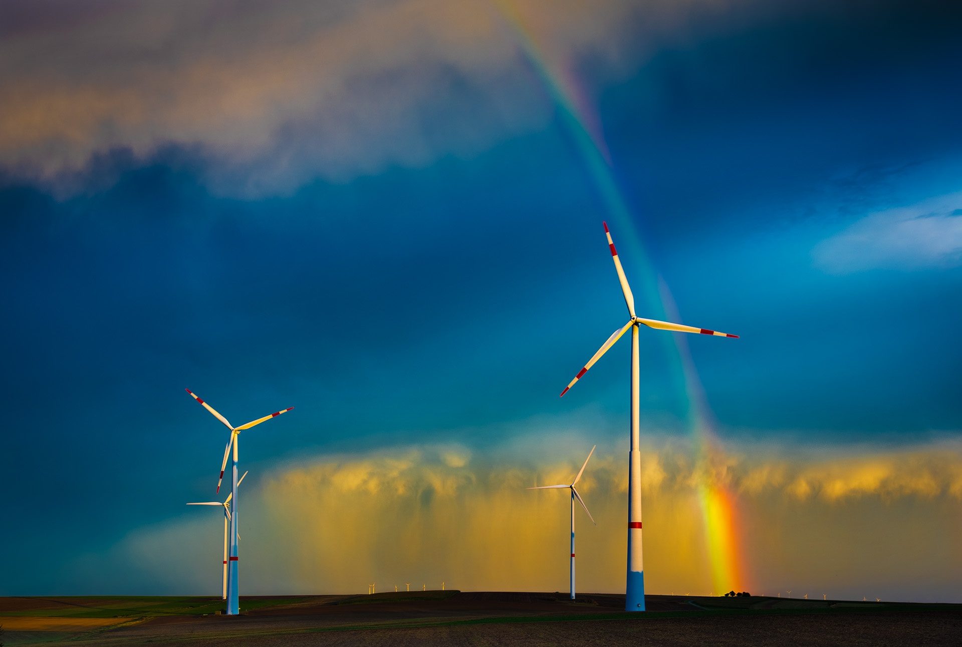 Download mobile wallpaper Landscape, Rainbow, Cloud, Wind Turbine, Man Made for free.