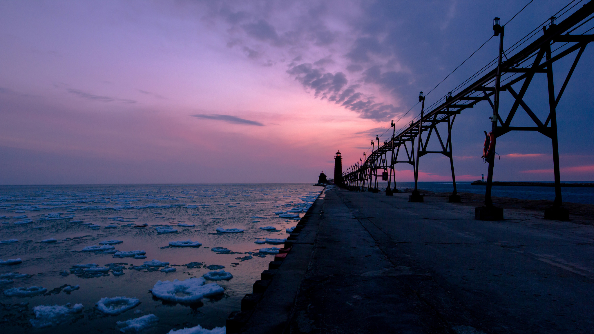 Download mobile wallpaper Sunset, Sea, Ice, Horizon, Pier, Ocean, Lighthouse, Man Made for free.